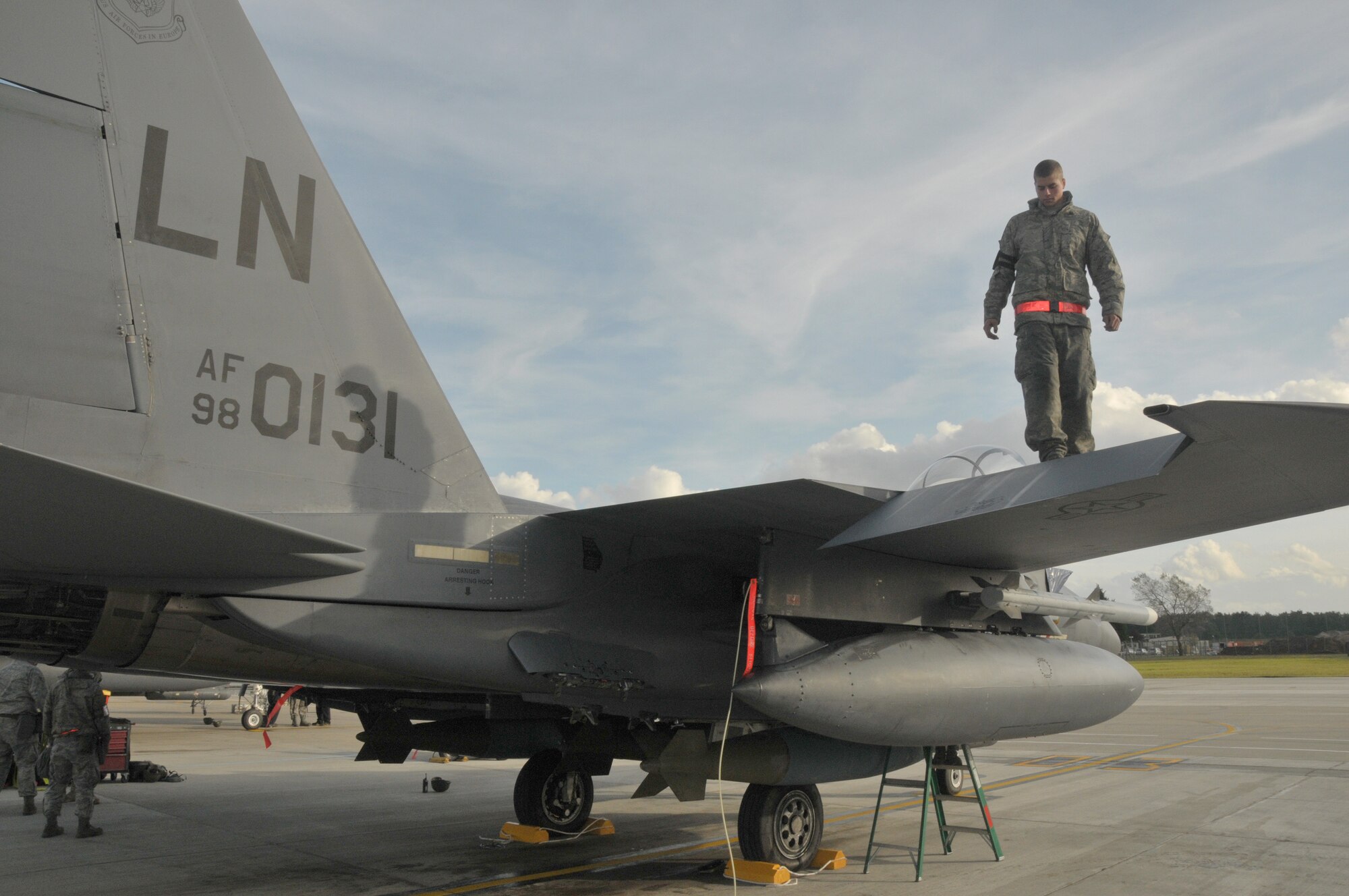 ROYAL AIR FORCE LAKENHEATH, England – Airman 1st Class Stephen Hudgins, 48th Aircraft Maintenance Squadron F-15 crew chief, performs a in-between “thru flight” inspection.  This inspection consisted of looking for loose or missing fasteners and any cracks on the airframe.  The Phase 1 ORI lasted Oct. 25 to 27.  (U.S. Air Force photo/Staff Sgt. Connor Estes)