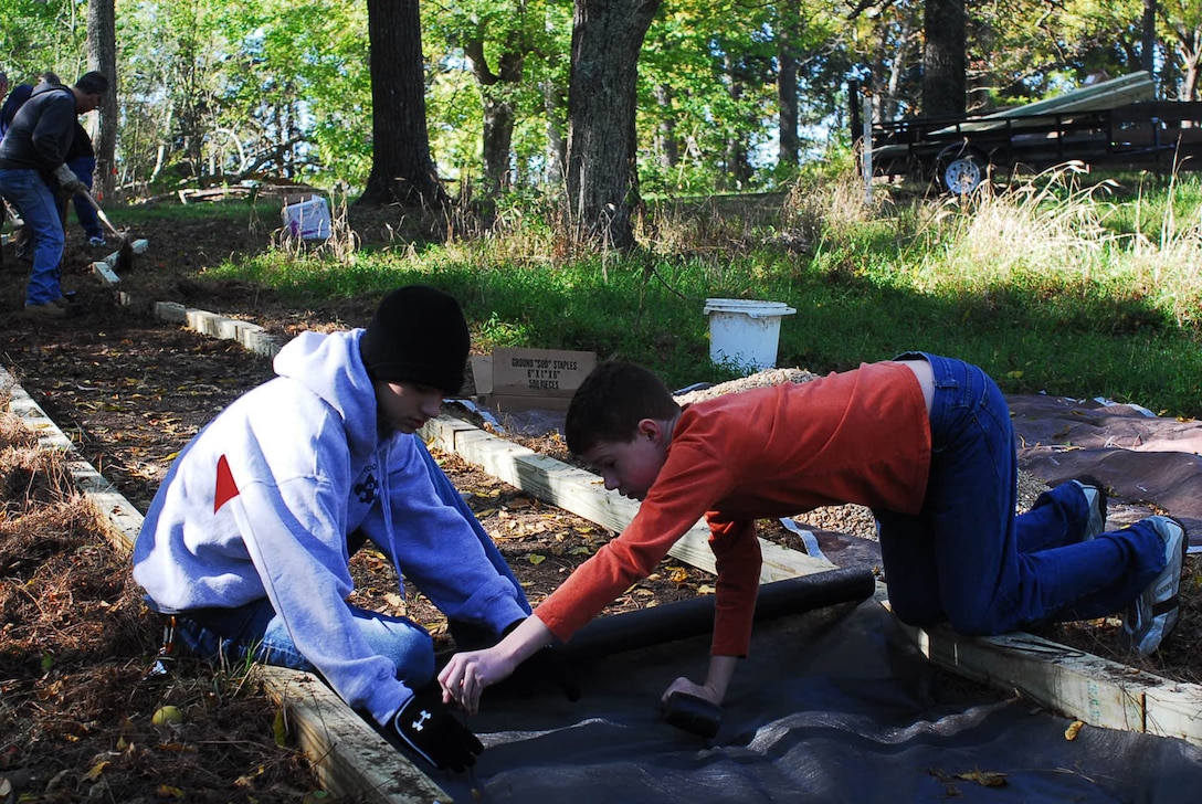 Mr. Vaughn and Mr. Currier work together to help make a trail at Fort Crafford during National Public Lands Day Saturday, which was moved from Sept. 25 to Saturday to be in conjunction with Archaeology Month. Fort Crafford, located at Training Area 28 on Fort Eustis, was the second part of the tour. The fort is a pentagon-shaped earthwork constructed in 1861 to 1862 by Confederate forces. It became the right anchor for Maj. Gen. John Magruder’s line of defense across the Peninsula from Yorktown. Crafford was designated a National Historic Place in 1974.