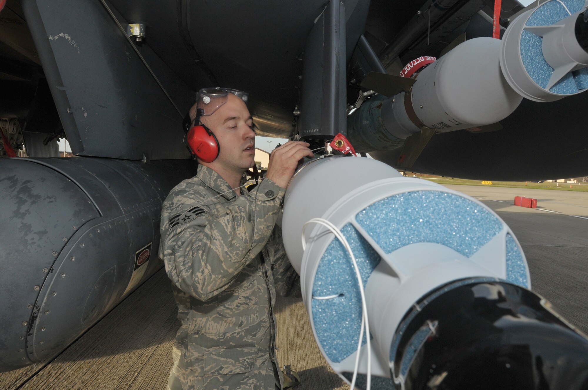 ROYAL AIR FORCE LAKENHEATH, England – Senior Airman Jedidiah Williamson, 48th Aircraft Maintenance Squadron weapons load crew member, inspects that a weapon has been loaded properly on an F-15 during the Operation Readiness Inspection Oct. 27.  The Phase 1 ORI lasted Oct. 25 to 27 and tested whether Liberty Airmen have a working knowledge of their job as well as the ability to find the answers to any questions they don't know the answer to.  (U.S. Air Force photo/Staff Sgt.  Connor Estes)