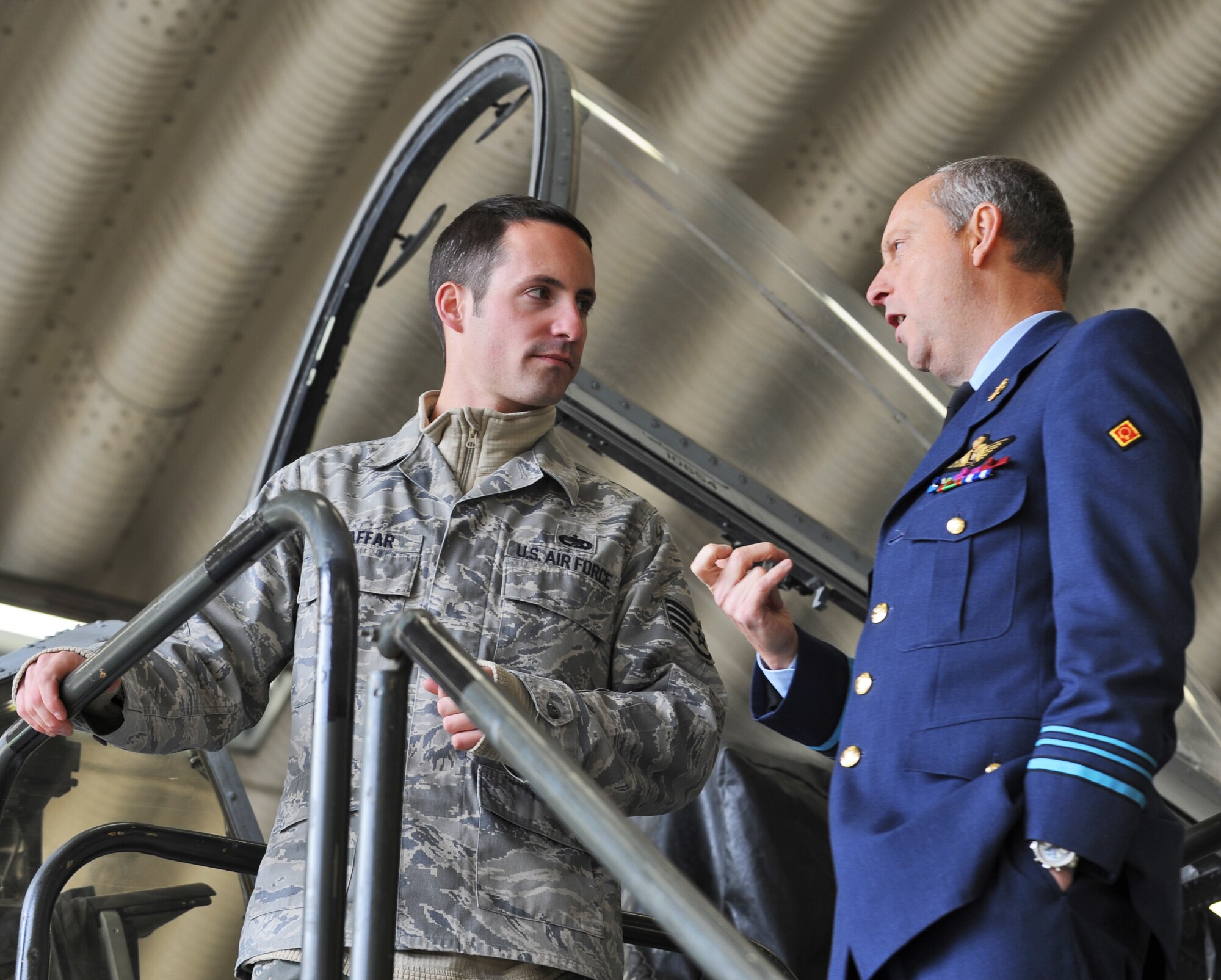 SPANGDAHLEM AIR BASE, Germany – Staff Sgt. Jesse Swaffar, 52nd Aircraft Maintenance Squadron avionics specialist, speaks to Lt. Col. Chris Goossens, Belgian Defense College instructor, about new features and upgrades to the A-10 Thunderbolt II Oct 28. Belgian Defense College members visited the base to get a better insight to how our people and aircraft support the warfighters within the Air Expeditionary Force concept. (U.S. Air Force photo/Senior Airman Nick Wilson)