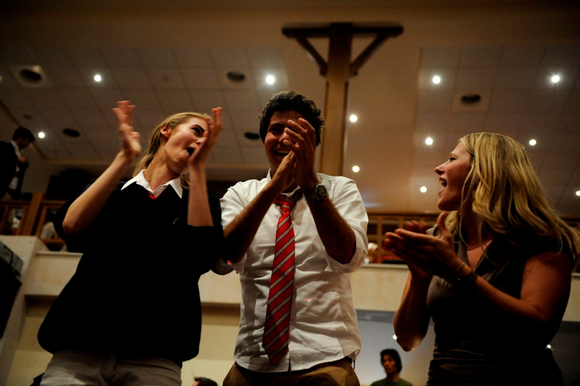 U.S. Air Force Airman 1st Class Megan Hokaj from U.S. Air Forces Central Band "Galaxy" dances with students during a performance at King's Academy in Madaba, Jordan, Oct. 27, 2010.  Galaxy performs for audiences throughout Southwest Asia to help build relations with international partners.  (U.S. Air Force Photo/Staff Sgt. Eric Harris)