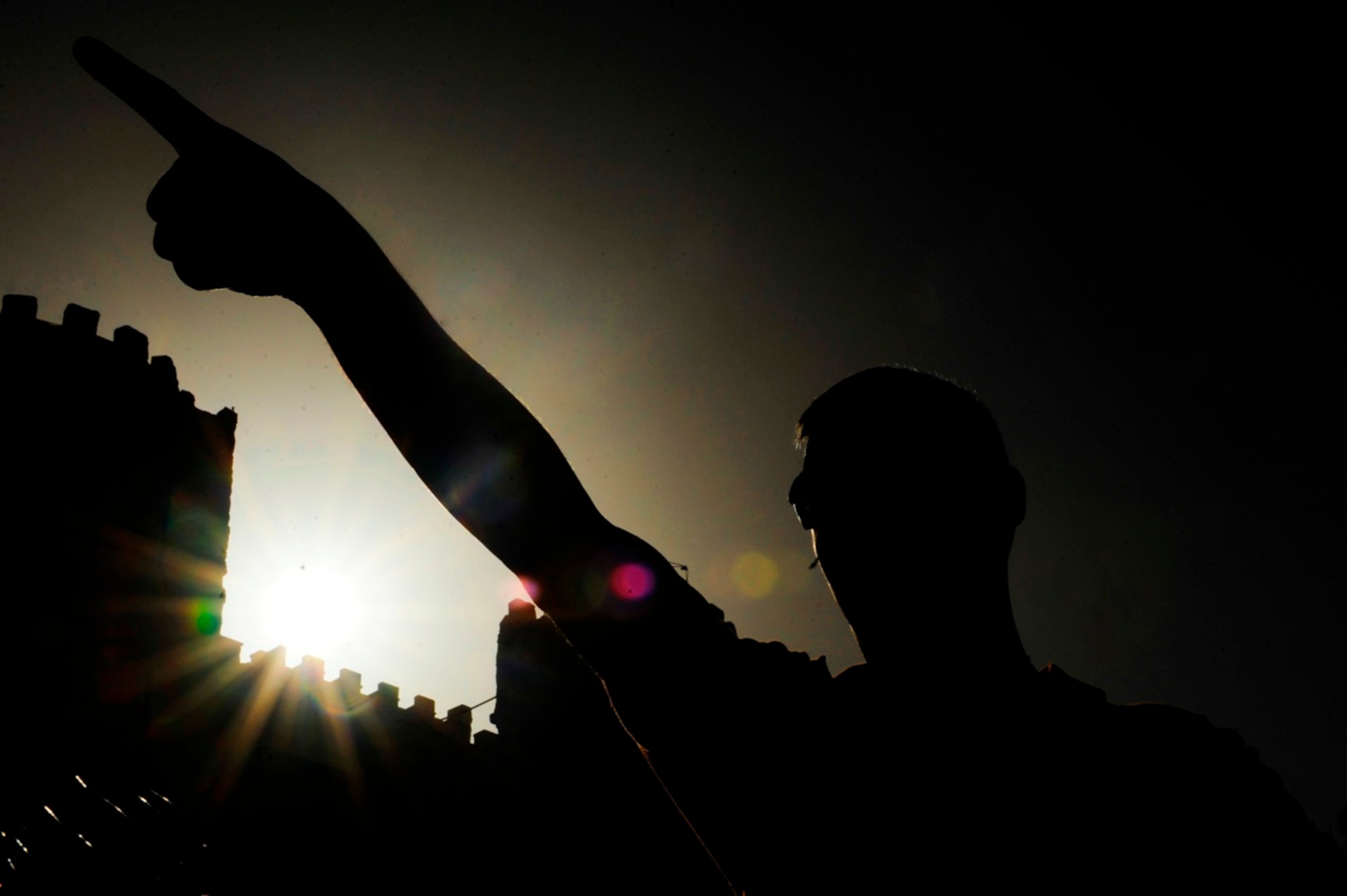 U.S. Air Force Master Sgt. Dodd Martin from U.S. Air Forces Central Band "Galaxy" balances the audio levels of the band before a performance for students at Fatime Zahra' School for Girls in Amman, Jordan, Oct. 27, 2010.  Galaxy performs for audiences throughout Southwest Asia to help build relations with international partners.  (U.S. Air Force Photo/Staff Sgt. Eric Harris)