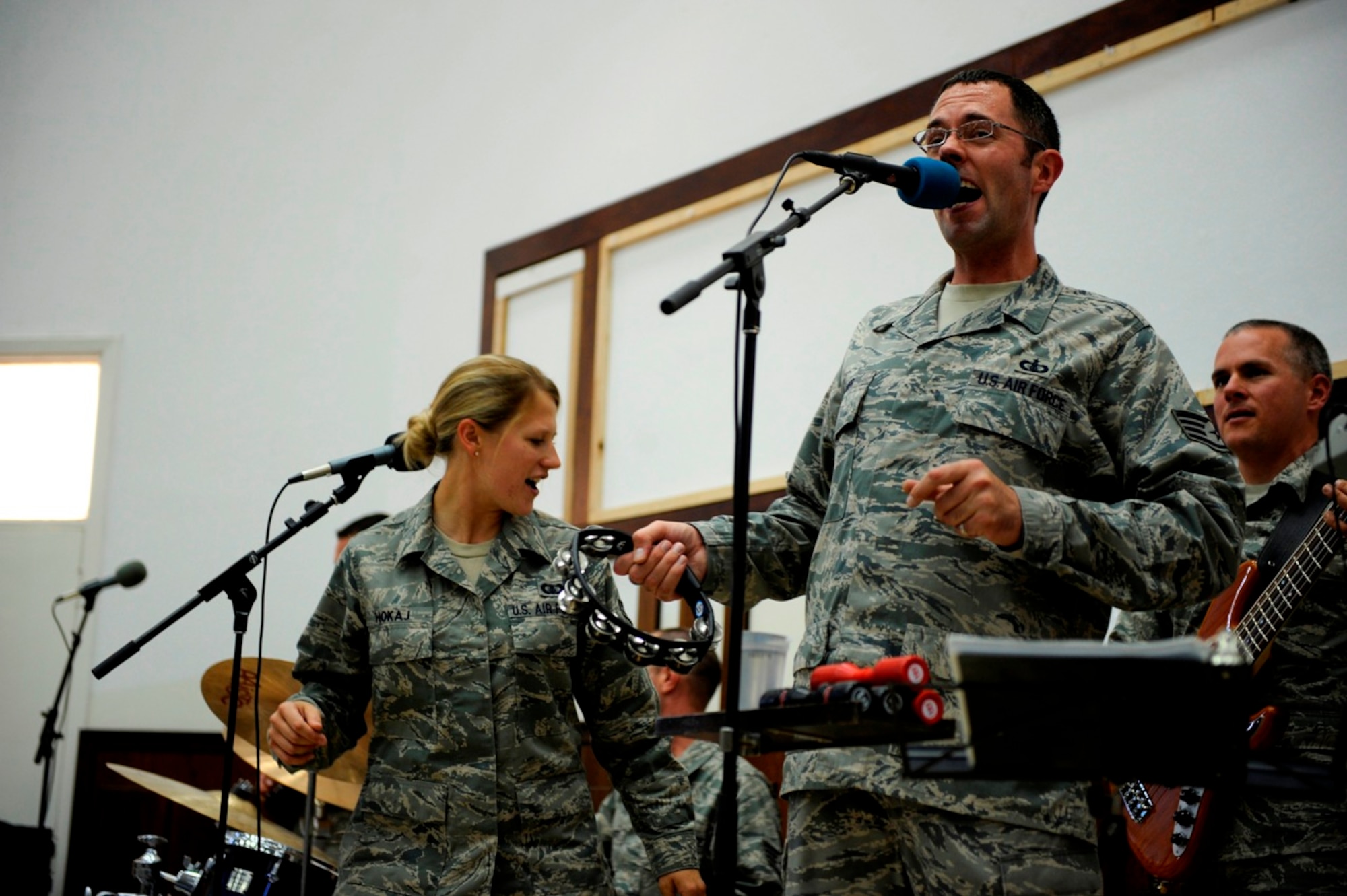 U.S. Air Force Staff Sgt. Geoffery Fisher from U.S. Air Forces Central Band "Galaxy" sings during a performance for students at Mu'tah University in Karak, Jordan, Oct. 26, 2010.  Galaxy performs for audiences throughout Southwest Asia to help build relations with international partners.  (U.S. Air Force Photo/Staff Sgt. Eric Harris) 