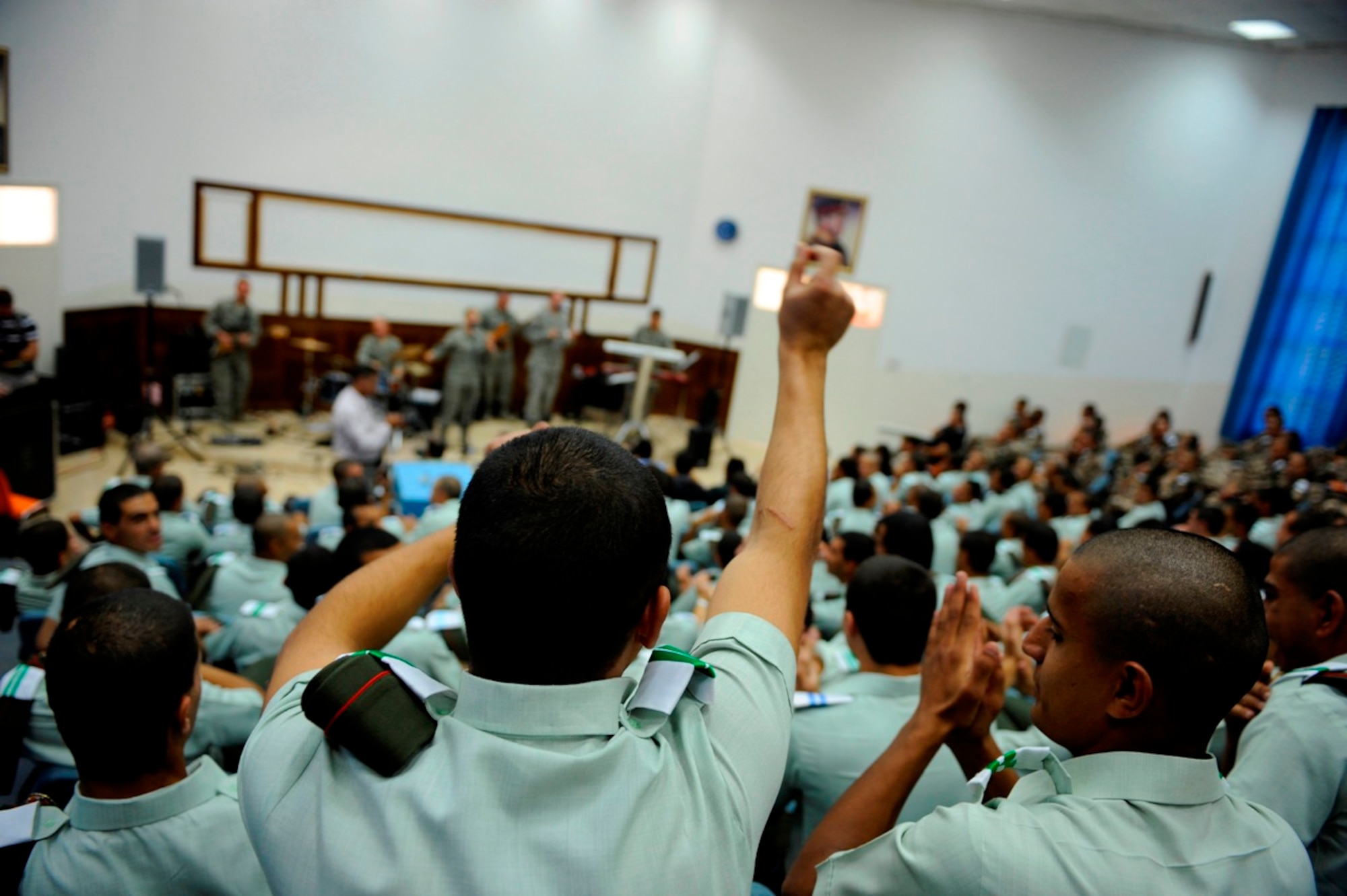 Students cheer for U.S. Air Forces Central Band "Galaxy" at Mu'tah University in Karak, Jordan, Oct. 26, 2010.  Galaxy performs for audiences throughout Southwest Asia to help build relations with international partners.  (U.S. Air Force Photo/Staff Sgt. Eric Harris)