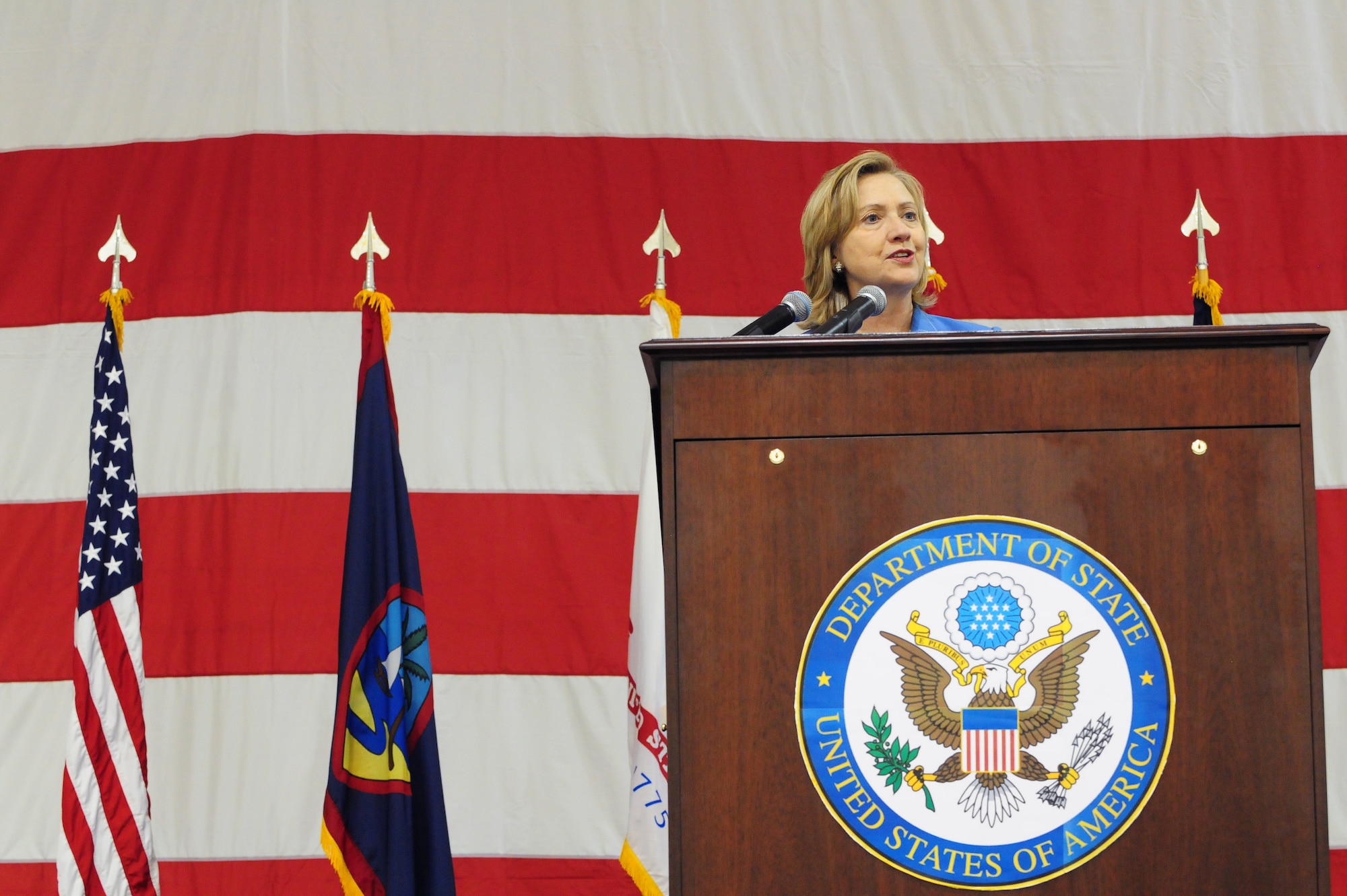 Secretary of State of the United States Hillary Rodham Clinton speaks to more than 1,000 Airmen, Soldiers, Sailors and Marines at Andersen Air Force Base Oct. 29, 2010. Clinton visited the base as part of her trip to the Asia-Pacific Region. She reaffirmed Guam?s importance to the nation, and her gratitude to the service members for their dedication and sacrifice.  (U.S. Air Force photo /Senior Airman Nichelle Anderson/ released)