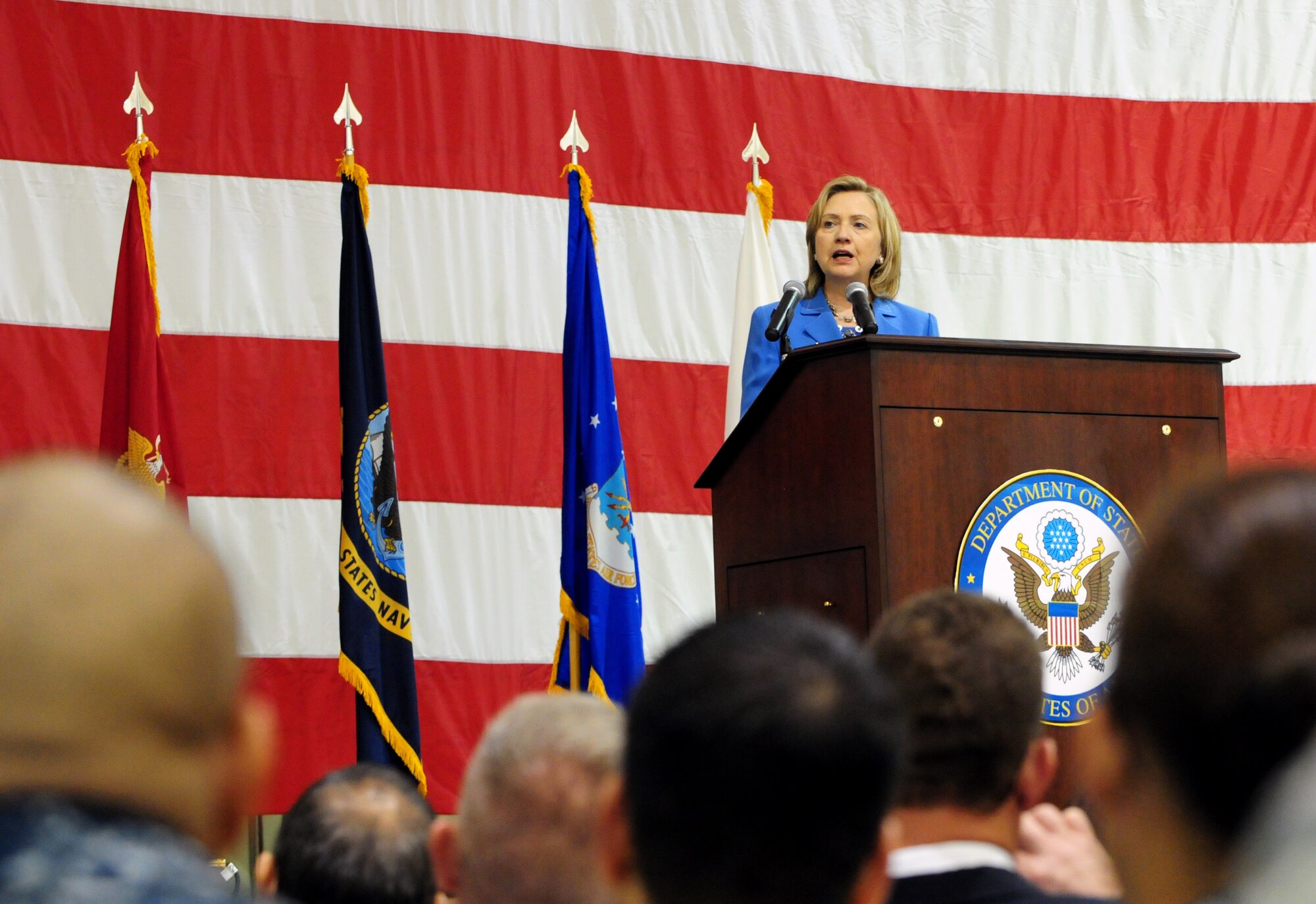 Secretary of State of the United States Hillary Rodham Clinton speaks to more than 1,000 Airmen, Soldiers, Sailors and Marines at Andersen Air Force Base Oct. 29, 2010. Clinton visited the base as part of her trip to the Asia-Pacific Region. She reaffirmed Guam?s importance to the nation, and her gratitude to the service members for their dedication and sacrifice.  (U.S. Air Force photo /Senior Airman Nichelle Anderson/ released)