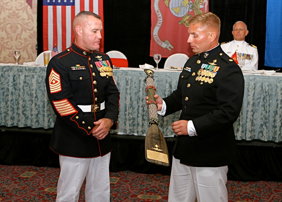 101029-M-6179W-096: Sergeant Maj. William F. Fitzgerald III, the sergeant major of United States Marine Corps Forces South, is awarded a reconnaissance paddle by Maj. Bradford Carr, commanding officer of Force Reconnaissance Company, II Marine Expeditionary Force, Oct. 29, 2010. Fitzgerald was the guest of honor at the Force Reconnaissance Co. ball.