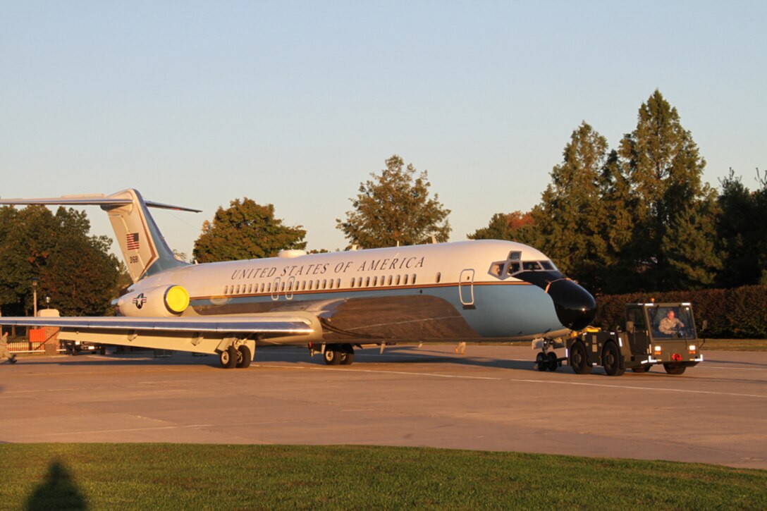 As the sun rises, Air Force Reserve Command maintenance members prepare the 932nd Airlift Wing's C-9C aircraft for an early morning flight.  The 932nd Maintenance Group is based at Scott Air Force Base and performs detailed work on both the C-9C and C-40C aircraft, both before and after each flight.  (U.S. Air Force photo/Maj. Stan Paregien)