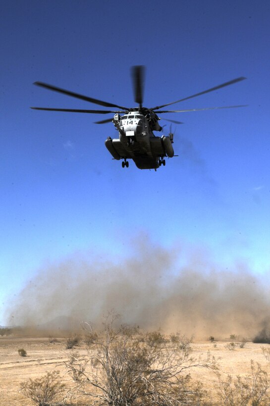 A CH-53E Super Stallion takes off during the final exercise of the recent Weapons and Tactics Instructor Course at Auxiliary Airfield 6 on the Barry M. Goldwater Range in Arizona Oct. 30, 2010. Operation War Wagon, tested the skills learned by the WTI students and included the participation of approximately 250 infantry Marines from the battalion.