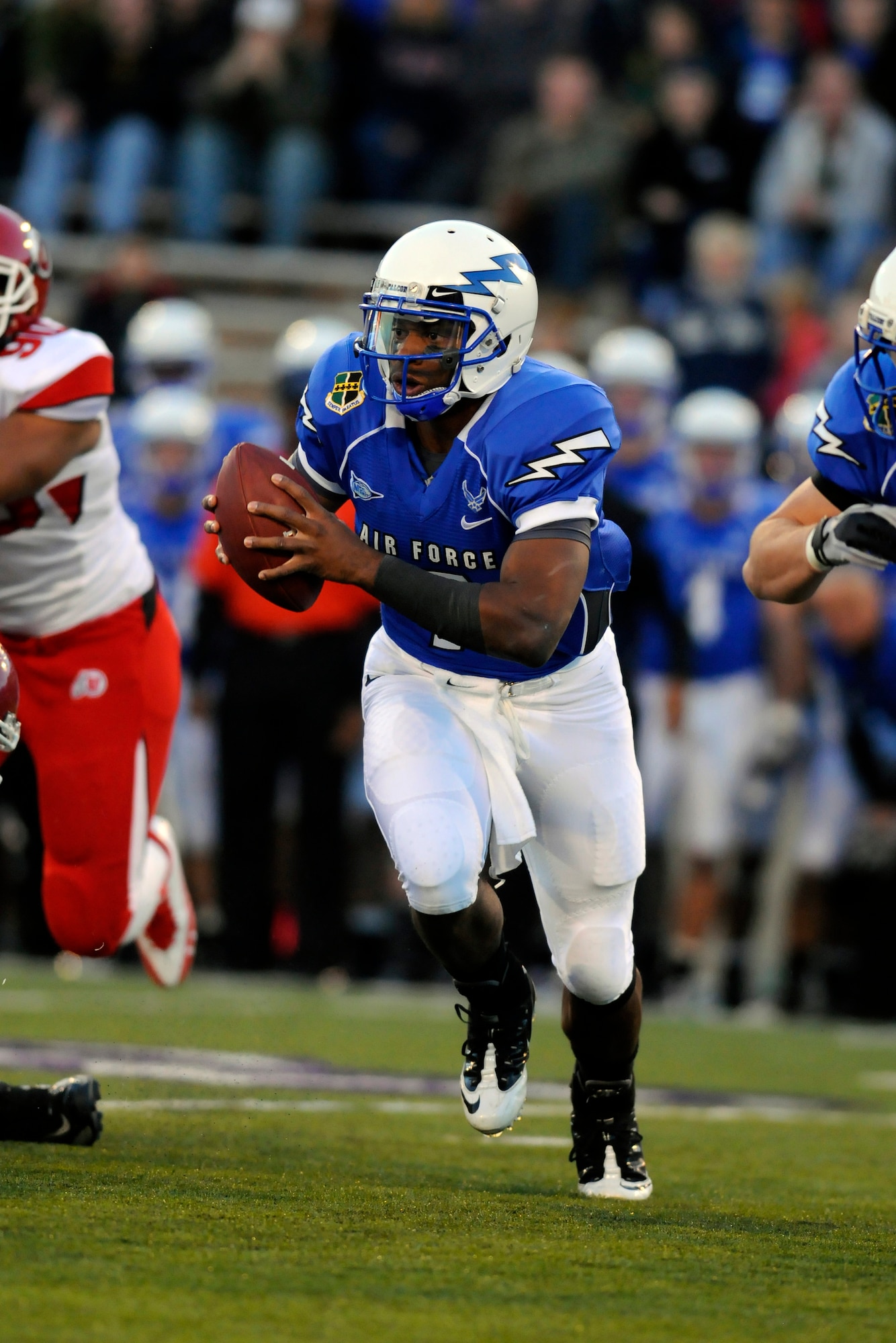 Air Force Junior quarterback Tim Jefferson runs upfield during an option play against against Utah at Falcon Stadium Oct 30, 2010. Jefferson, an Atlanta native, was 8-of-13 for 201 yards, one touchdown and two interceptions. He also carried the ball 16 times for 67 yards in the Falcons' 28-23 loss. (U.S. Air Force photo/Johnny Wilson)
