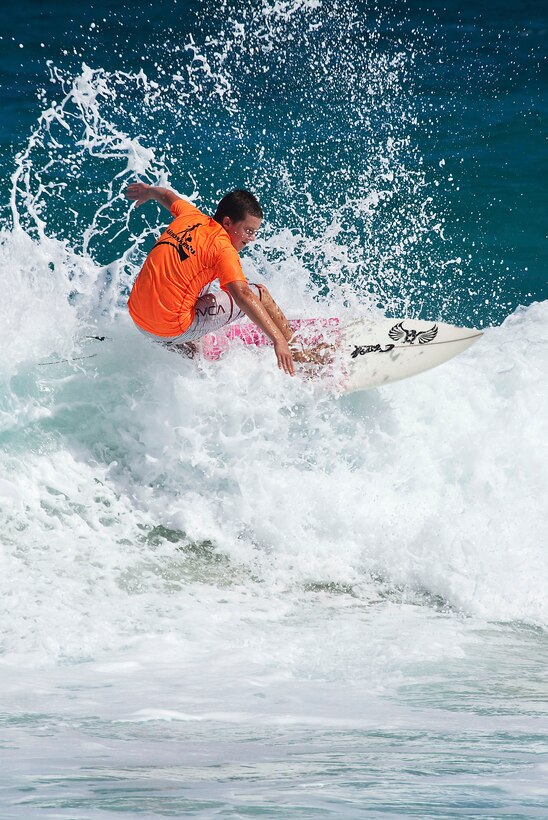 T.J. Metcalf gets into his element during a heat at the Kuau Rockin’ Surf Competition at Pyramid Rock Beach on Marine Corps Base Hawaii, Oct. 31, 2010. Out of approximately 50 other surfers, Metcalf placed third in the men’s 18-24 year old short board category. The competition was open to both service members and the local community.