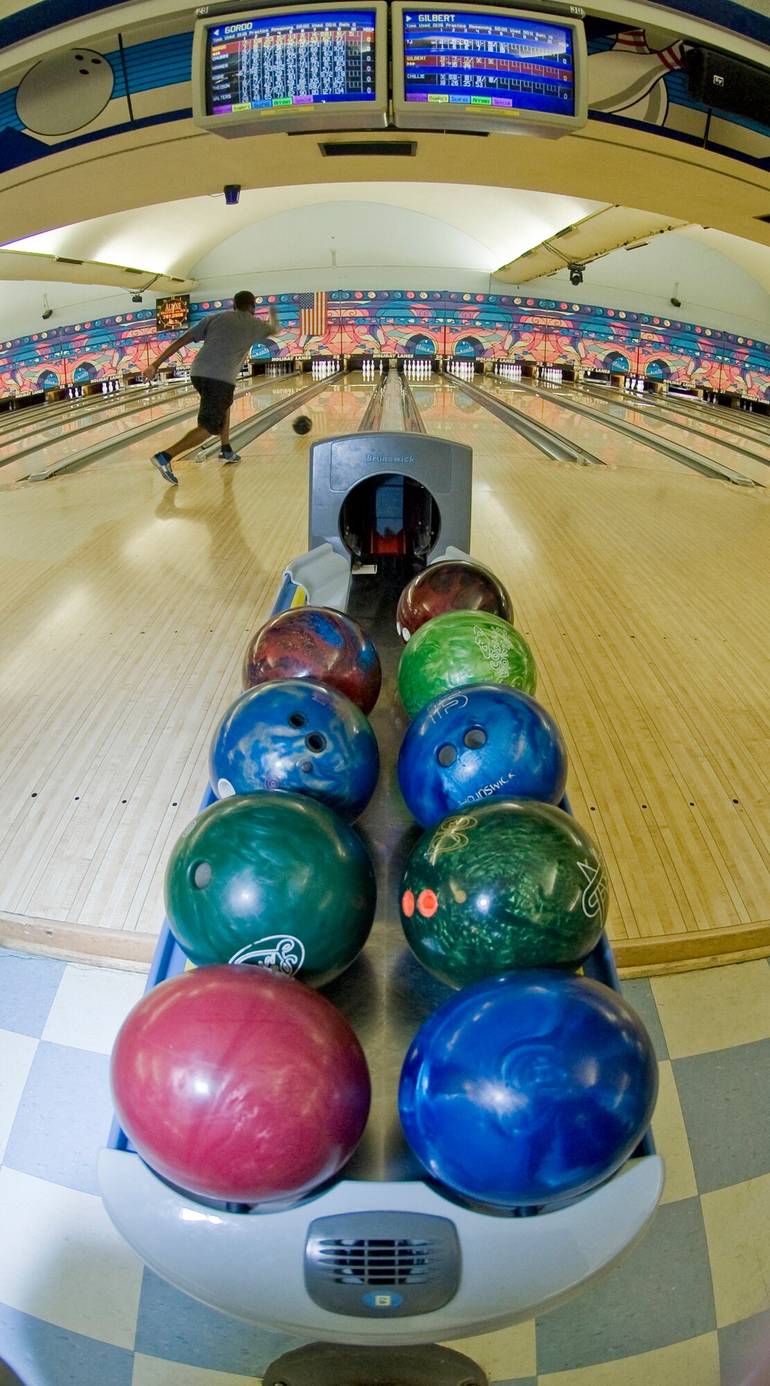 BOSSIER CITY, La. -- Staff Sgt. Derrick Gordon, 2d Munitions Squadron, bowls during a fundraiser hosted by the Logistics Officer Association at Barksdale Air Force Base for the Bossier Parrish Community College 100 Aug. 27 at Holiday Lanes. The BPCC 100 is a mini NASCAR style race which raises money to provide scholarships to BPCC students. (U.S. Air Force photo by Senior Airman Chad Warren) (RELEASED)
