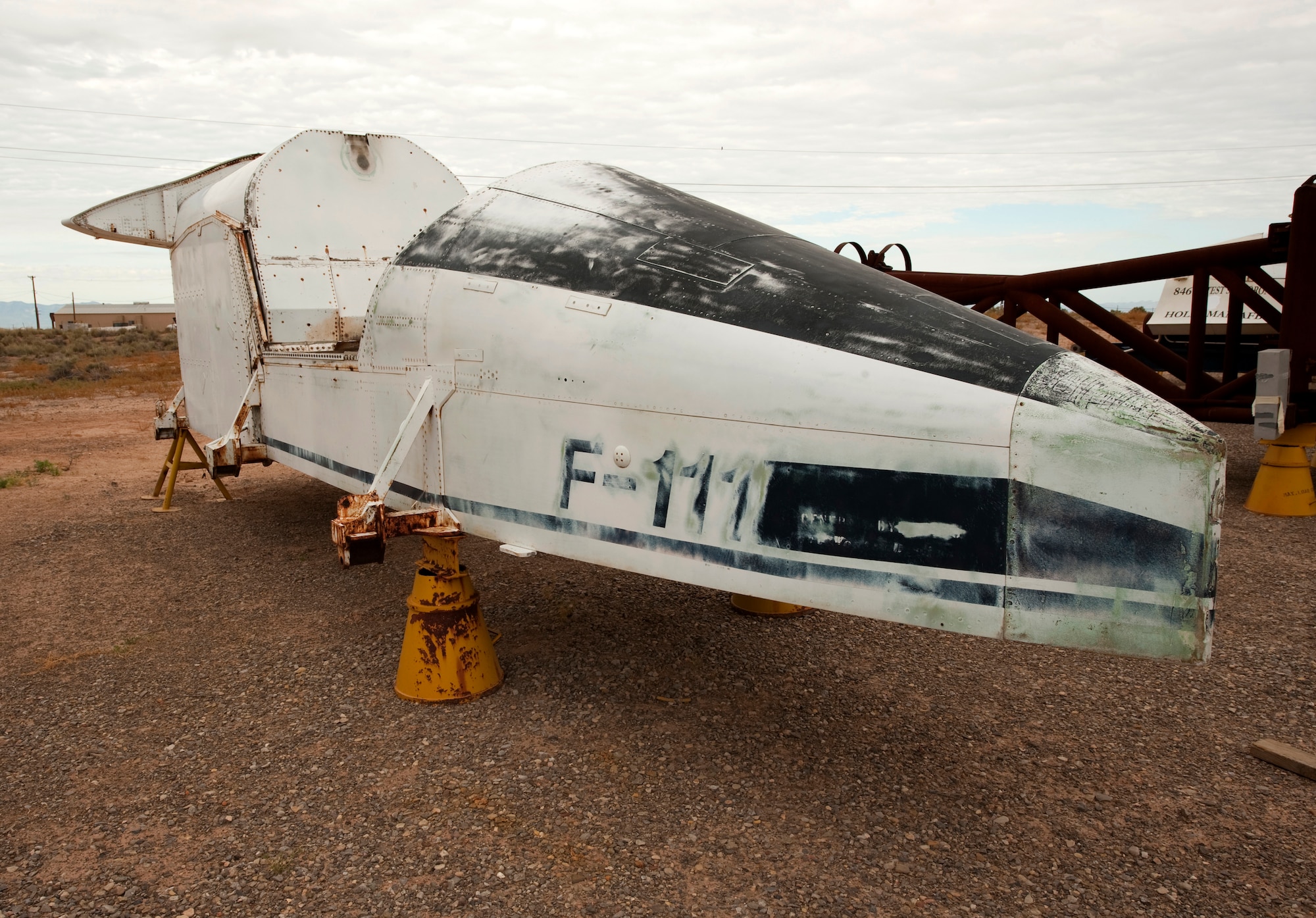 HOLLOMAN AIR FORCE BASE, N.M. -- An F-111 sled that was once used for ejection seat testing on the Holloman High Speed Test Track sits in the 846th Test Squadron "bone yard," July 16, 2010. This sled is scheduled to be repainted by corrosion control specialists from the squadron, and restored to its original state in order to be displayed at the Sled Park. (U.S. Air Force photo by Senior Airman Sondra Escutia)