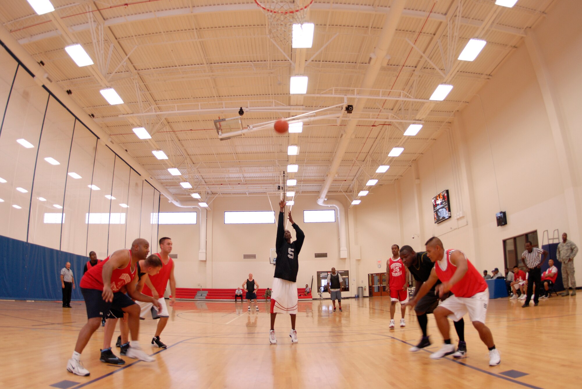 VANDENBERG AIR FORCE BASE, Calif. -- Anthoney Kilgore, a 30th Launch Group member, throws a free throw during the over 30 intramural basketball league finals at the base fitness center here Monday, Aug. 30, 2010.  The 30th LCG team won 49-39.  (U.S. Air Force photo/Senior Airman Andrew Satran) 

 