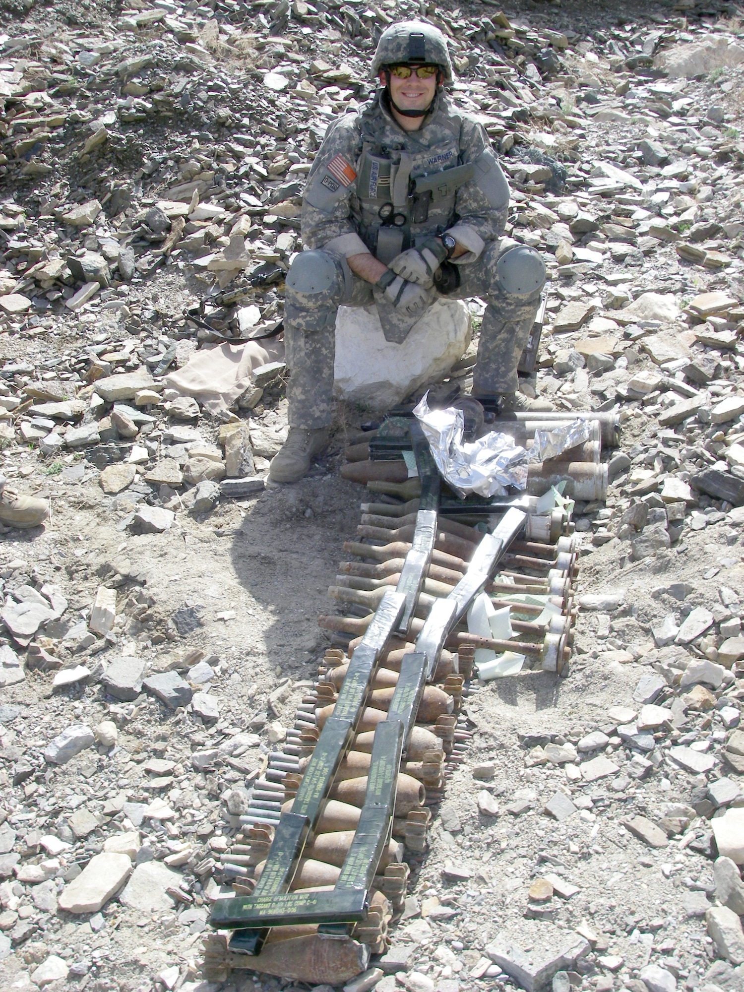 Staff Sgt. Alonzo E. Warner, 509th Civil Engineer Squadron, recovers unexploded ordnance while clearing routes in Afghanistan in 2008. Sergeant Warner recently returned returned from another deployment to Kirkuk Air Base, Iraq in March. While there, he and his EOD team members were responsible for clearing routes for convoys, training military members, and supporting the airfield by removing unexploded ordnance.