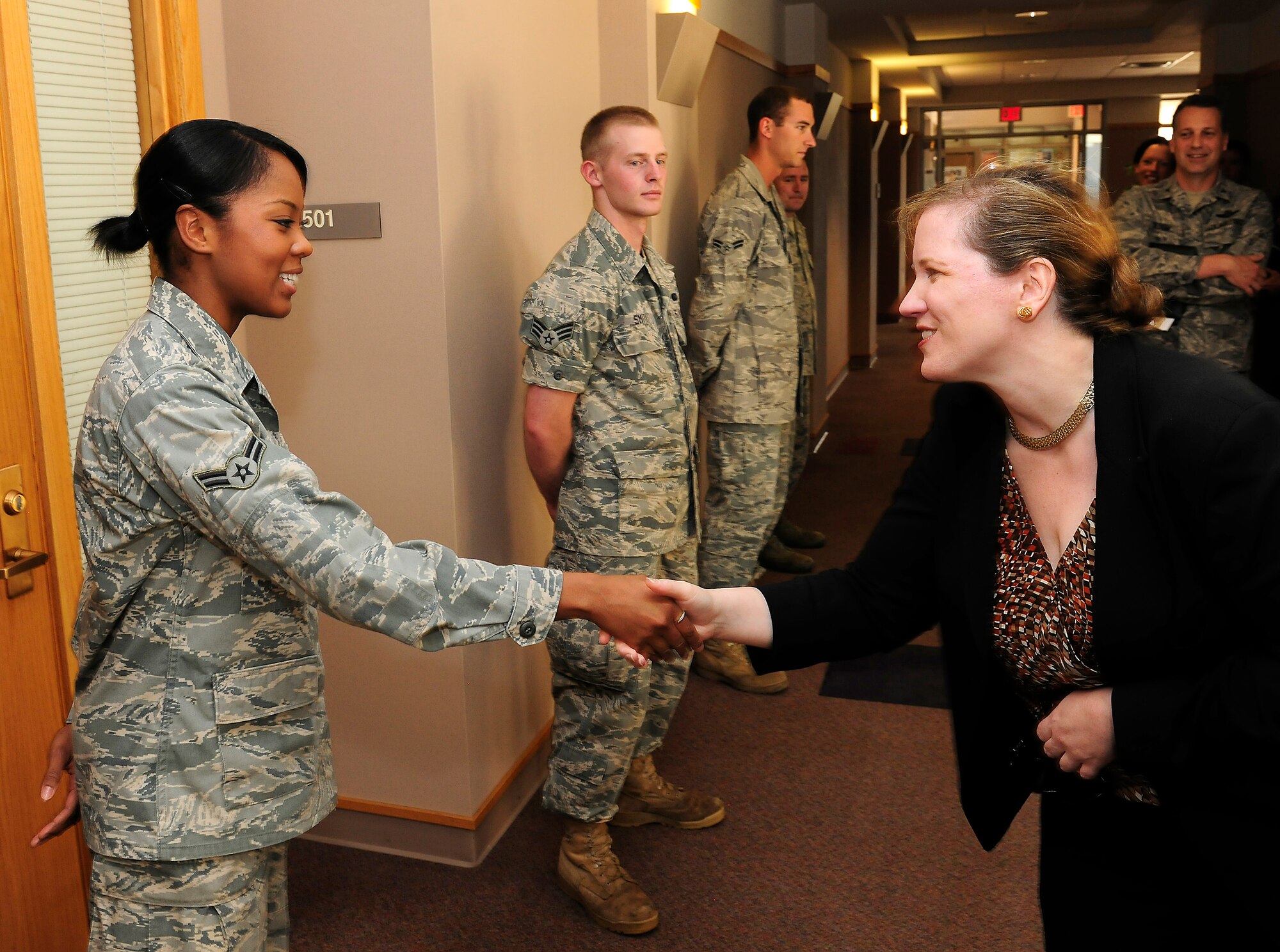 Under Secretary Erin Conaton meets Airmen attending the 28th Bomb Wing's First Term Airmen Center, Aug. 27, 2010, at Ellsworth Air Force Base, S.D.  Ms. Conaton was at Ellsworth for a mission orientation briefing, following two other stops earlier in the week.  (U.S. Air Force photo/Scott M. Ash)