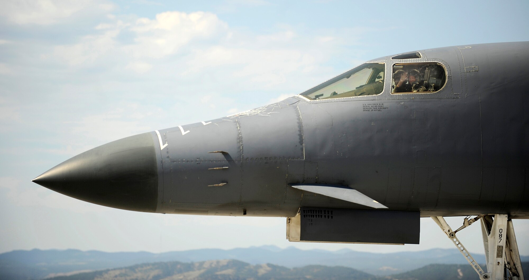 Under Secretary of the Air Force Erin Conaton waves from the left seat of a B-1 Lancer from the 34th Bomb Squadron at Ellsworth Air Force Base, S.D., Aug. 27, 2010.  Ms. Conaton was at Ellsworth for a mission orientation visit.  (U.S. Air Force photo/Scott M. Ash)