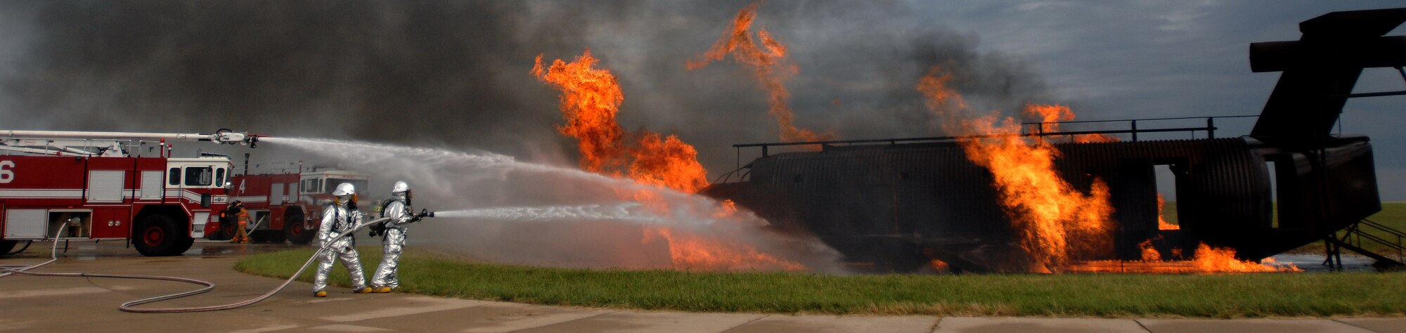 Firefighters from the 509th Civil Engineer Squadron work to extinguish a
simulated aircraft fire during a major accident response exercise, Aug. 31 at
Whiteman Air Force Base, Mo. Firefighters and other emergency response
personnel conducted the MARE to prepare for any mishaps that may occur during
the Wings Over Whiteman Air Show and Open House scheduled to take place
Sept. 18 and 19. (U.S. Air Force photo by Senior Airman Kenny
Holston)(Released)

