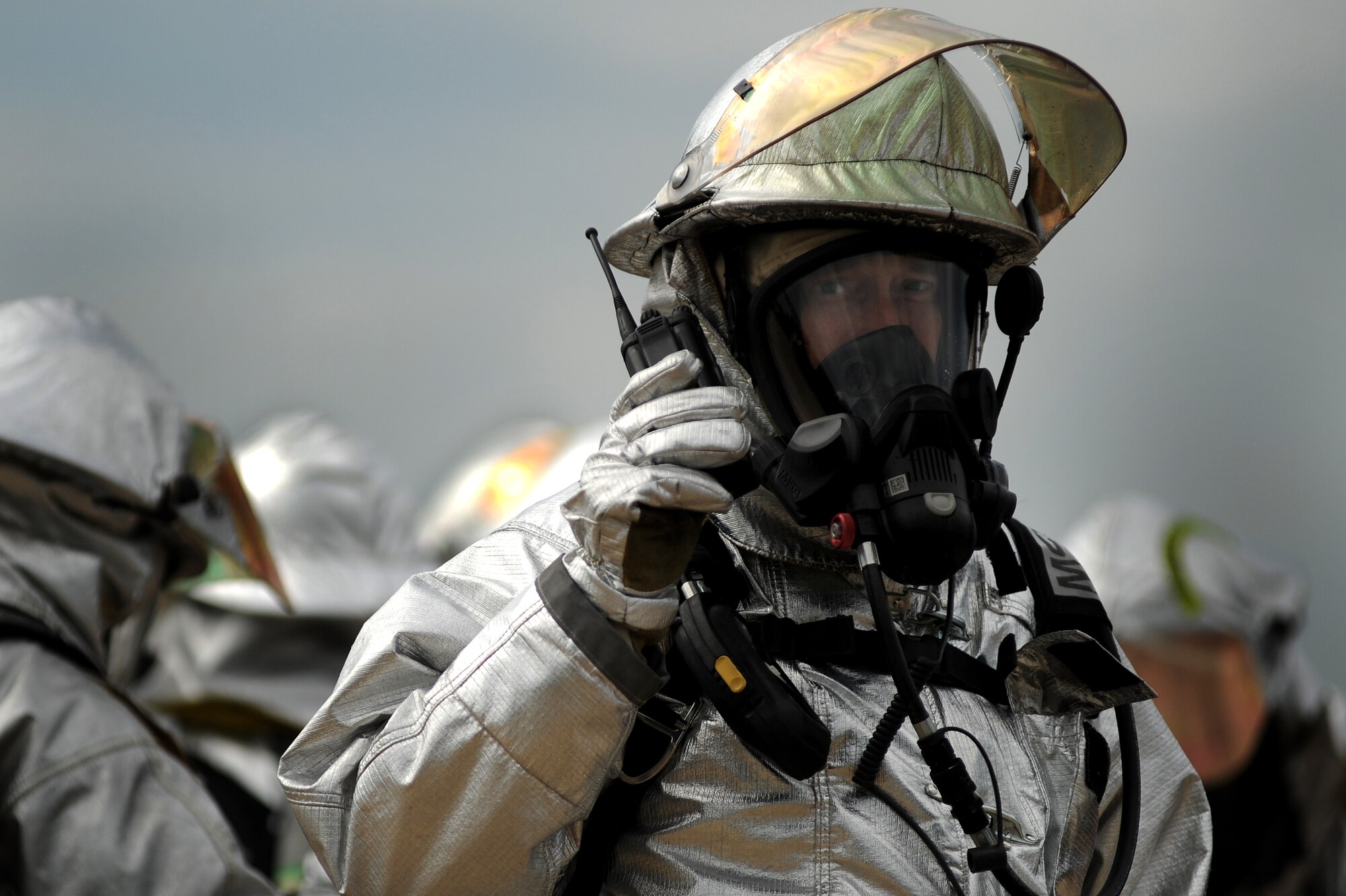A firefighter from the 509th Civil Engineer Squadron reports information of
a simulated aircraft fire during a major accident response exercise, Aug. 31
at Whiteman Air Force Base, Mo. Firefighters and other emergency response
personnel conducted the MARE to prepare for any mishaps that may occur during
the Wings Over Whiteman Air Show and Open House scheduled to take place
Sept. 18 and 19. (U.S. Air Force photo by Senior Airman Kenny
Holston)(Released)



