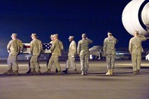 A U.S. Marine Corps team transfers the remains of Marine Corps Cpl. Max W. Donahue, of Highlands Ranch, Colo., at Dover Air Force Base, Del., August 8. Cpl. Donahue was assigned to I Marine Expeditionary Force Headquarters Group, I Marine Expeditionary Force, Camp Pendleton, Calif.  (U.S. Air Force photo/Roland Balik)