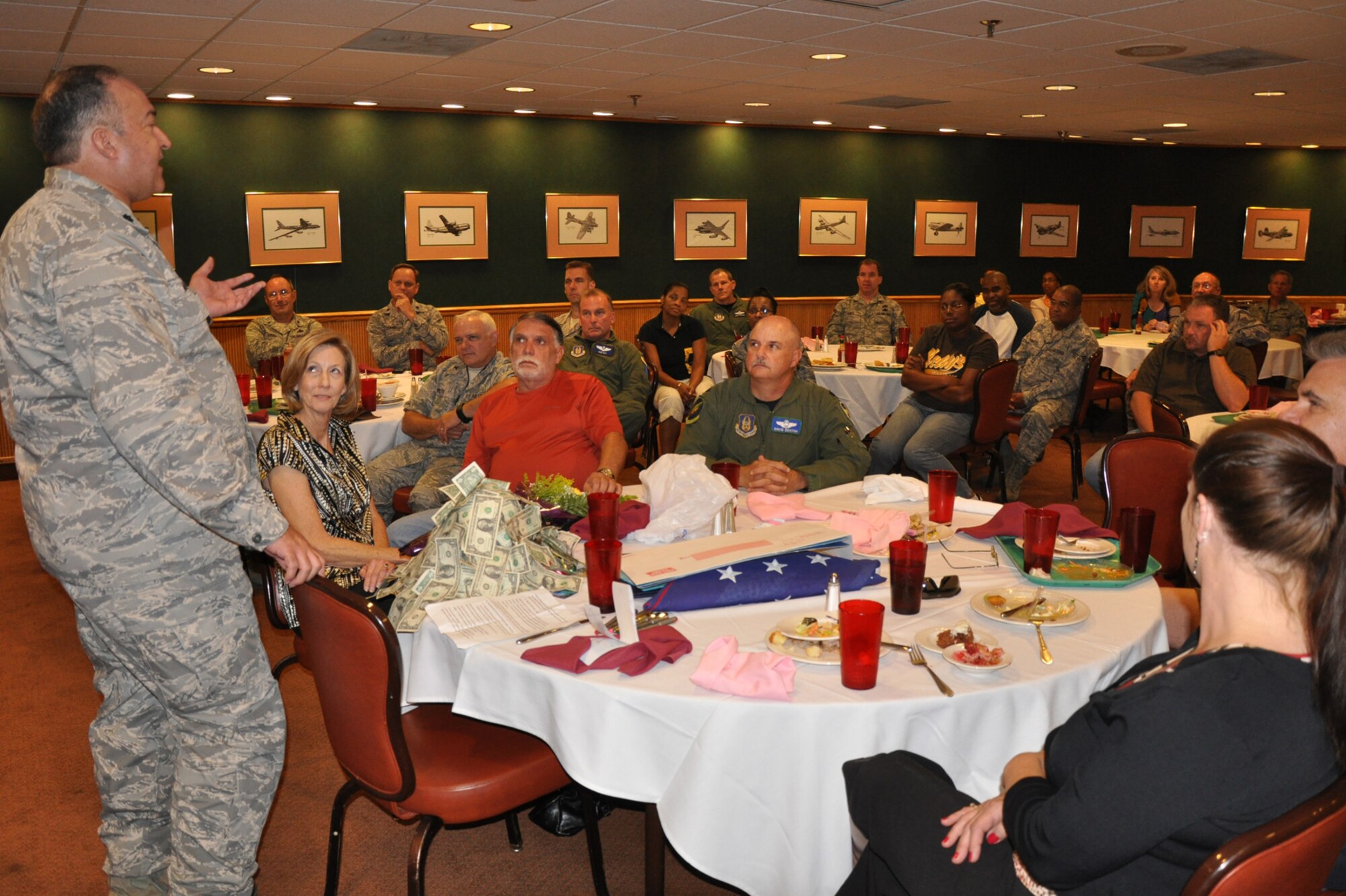 Lt. Col. Charlie Morgan, process manager for the 917th Wing, speaks to a packed room during his farewell luncheon at Barksdale Air Force Base, La., Aug. 27, 2010. Colonel Morgan is retiring this month after 34 years of both military and civilian service to his country. One of the highlights of Col. Morgan’s military career was from 1984-86 during his time flying the advanced long range, Mach 3+, strategic reconnaissance aircraft, SR-71 “Blackbird” or “Habu” as it is affectionately known by its crews. A colorful figure at the 917th Wing for the past 23 years, Col. Morgan plans to spend more time enjoying his three children’s college years with his wife Jeanne during his retirement years. (U.S. Air Force photo/Tech. Sgt. Jeff Walston)