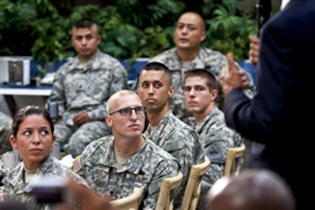 U.S. Army soldiers listen to President Barack Obama during his visit on Fort Bliss in El Paso, Texas, Aug. 31, 2010. Obana went to the post to thank all troops for contributions that led to the end of U.S. combat operations in Iraq.