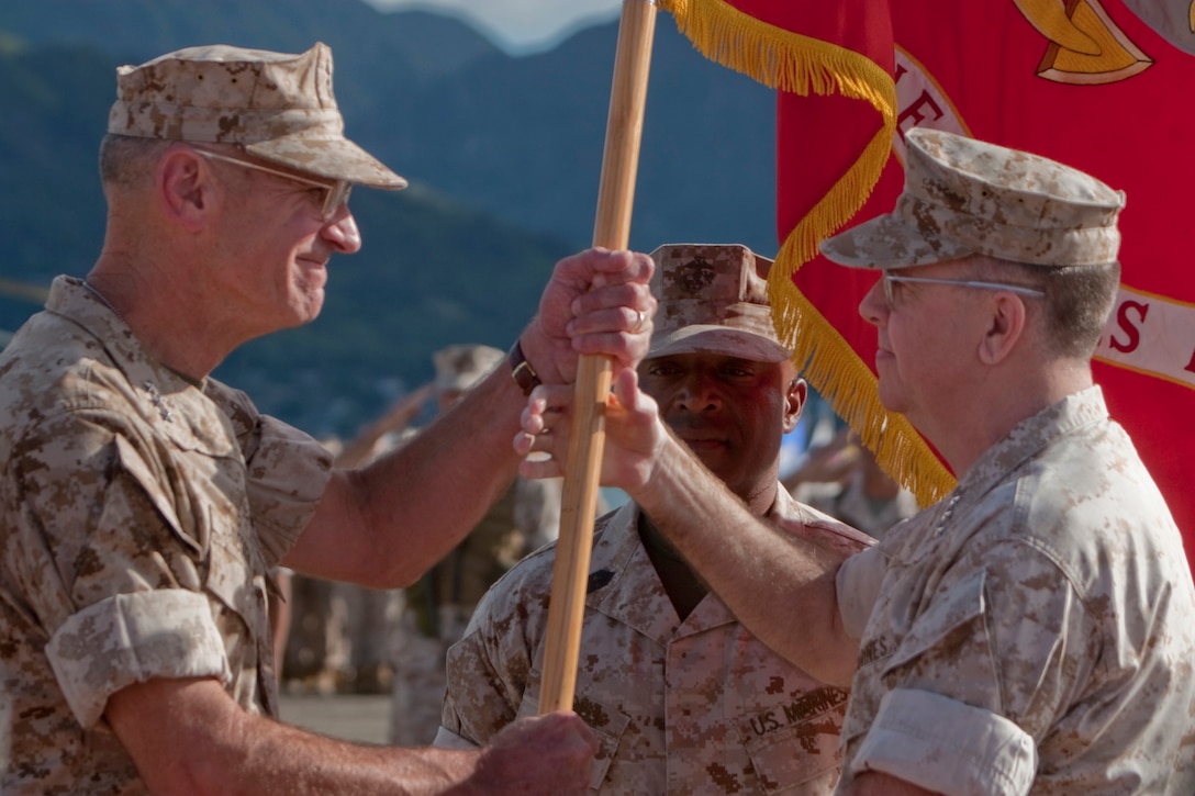 Lt. Gen. Keith J. Stalder (right) relinquishes command of U.S. Marine Corps Forces, Pacific, to Lt. Gen. Duane D. Thiessen Sept. 2 during a change of command ceremony at Marine Corps Base Hawaii, Kaneohe Bay. Thiessen served as the Deputy Commandant of the Marine Corps for Programs and Resources prior to his new position. Stalder retired during the ceremony after more than 37 years of service.