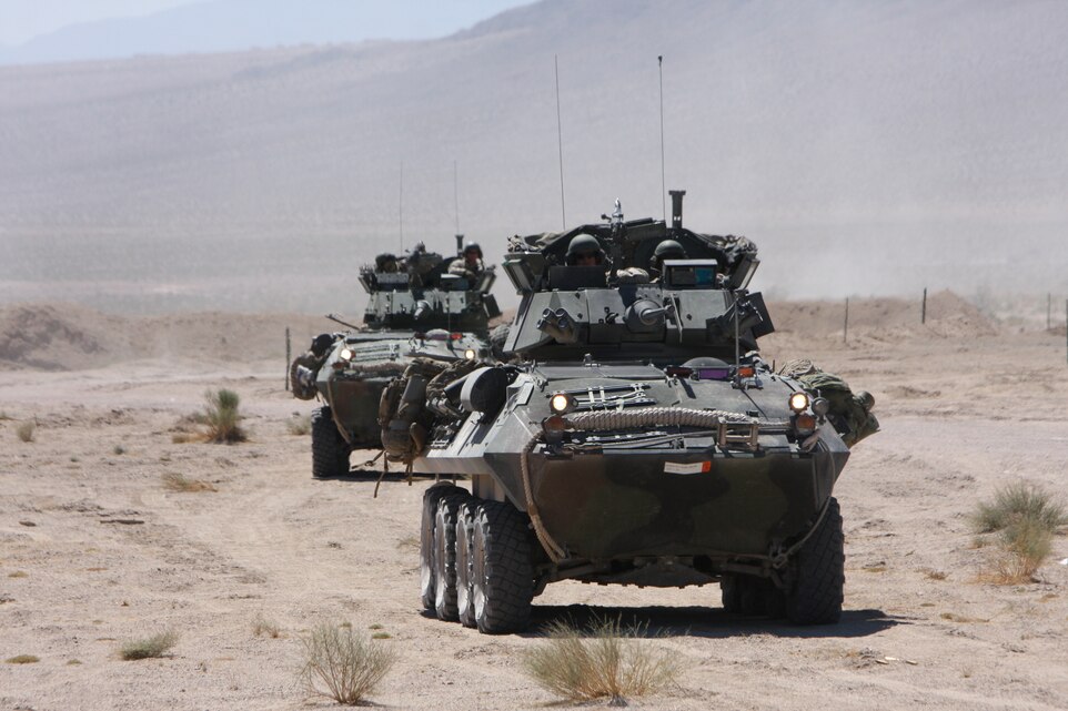 Light armored vehicles with 3rd Light Armored Reconnaissance Battalion push through to their next objective Sept. 2 during part of their Enhanced Mojave Viper. The exercise is a 28-day pre-deployment training process all units must undergo before they deploy.