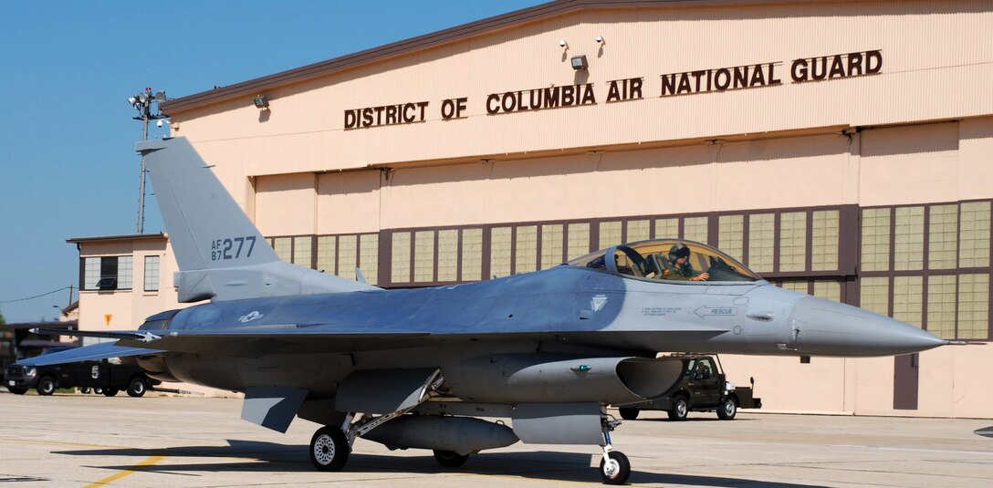 JOINT BASE ANDREWS, Md. -- The National Guard Association of the United States has named the 113th Wing the winner of the 2009 Spaatz Award. The 113th Wing was formally the 352nd Fighter Group, that was credited with destroying 791.5 enemy aircraft between 1943 and 1945. Initially equipped with the P-47 Thunderbolt aircraft, the 352nd transitioned to the P-51 Mustang just prior to D-Day, and it was with this aircraft that the unit obtained its greatest reputation. On D-Day the 352nd strafed and dive-bombed German communication sites. In May of 1944, the Group was awarded a Distinguished Unit Citation when it shot down 27 enemy aircraft on a escort mission to Brunswick, Germany. On Nov. 2, 1944, the Group shot down another 38 German planes in a single day. This was the second highest solo day score achieved by any Group in World War II. (U.S. Air Force phot by Tech. Sgt. Tyrell Heaton)