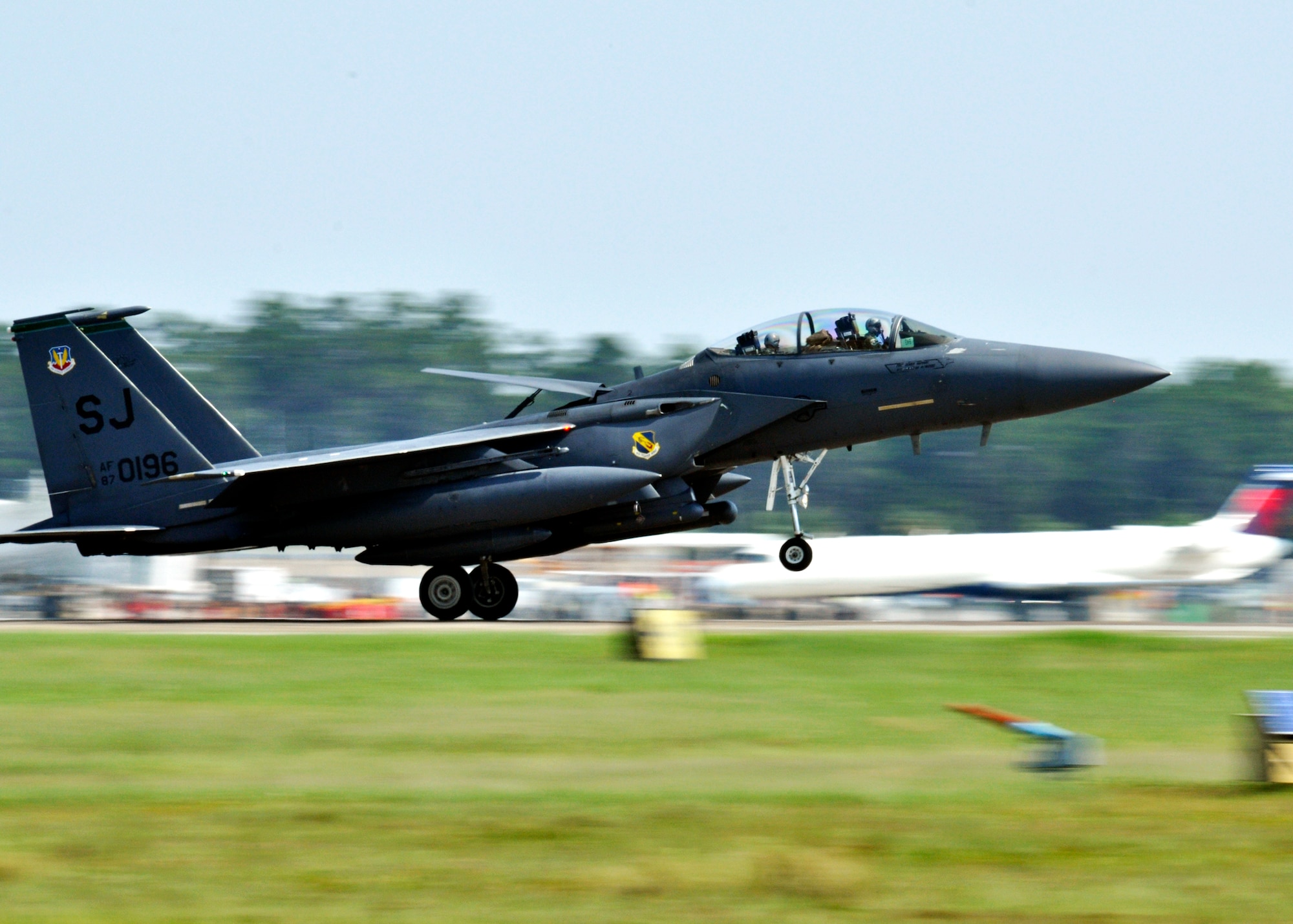 A 4th Fighter Wing F-15E Strike Eagle touches down at Eglin Air Force Base Fla., Sept. 2 as part of a hurricane evacuation from Seymour Johnson AFB, N.C.  Approximately 30 Strike Eagles, three KC-135 Stratotankers and 300 personnel arrived to beddown the aircraft as Hurricane Earl headed for the N.C. coast.  The 33rd Fighter Wing, a former F-15 unit now the training wing for the F-35 Lightning II, provided flightline space for the aircraft.  (U.S. Air Force photo/Samuel King Jr.)