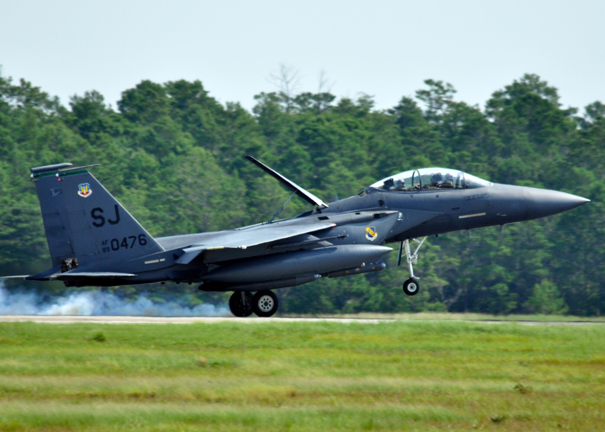 A 4th Fighter Wing F-15E Strike Eagle touches down at Eglin Air Force Base Fla., Sept. 2 as part of a hurricane evacuation from Seymour Johnson AFB, N.C.  Approximately 30 Strike Eagles, three KC-135 Stratotankers and 300 personnel arrived to beddown the aircraft as Hurricane Earl headed for the N.C. coast.  The 33rd Fighter Wing, a former F-15 unit now the training wing for the F-35 Lightning II, provided flightline space for the aircraft.  (U.S. Air Force photo/Samuel King Jr.)