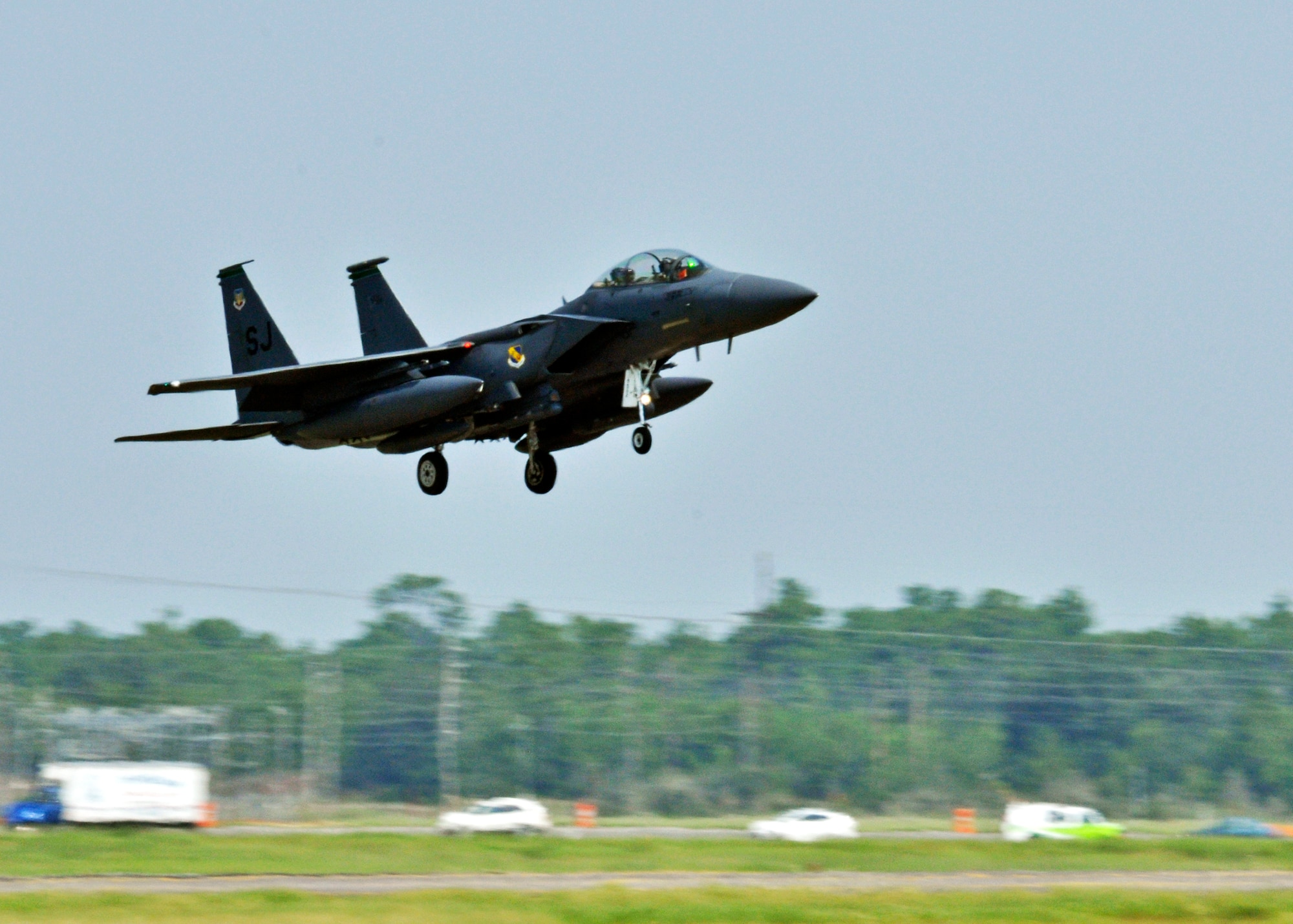 A 4th Fighter Wing F-15E Strike Eagle comes in to land at Eglin Air Force Base Fla., Sept. 2 as part of a hurricane evacuation from Seymour Johnson AFB, N.C.  Approximately 30 Strike Eagles, three KC-135 Stratotankers and 300 personnel arrived to beddown the aircraft as Hurricane Earl headed for the N.C. coast.  The 33rd Fighter Wing, a former F-15 unit now the training wing for the F-35 Lightning II, provided flightline space for the aircraft.  (U.S. Air Force photo/Samuel King Jr.)