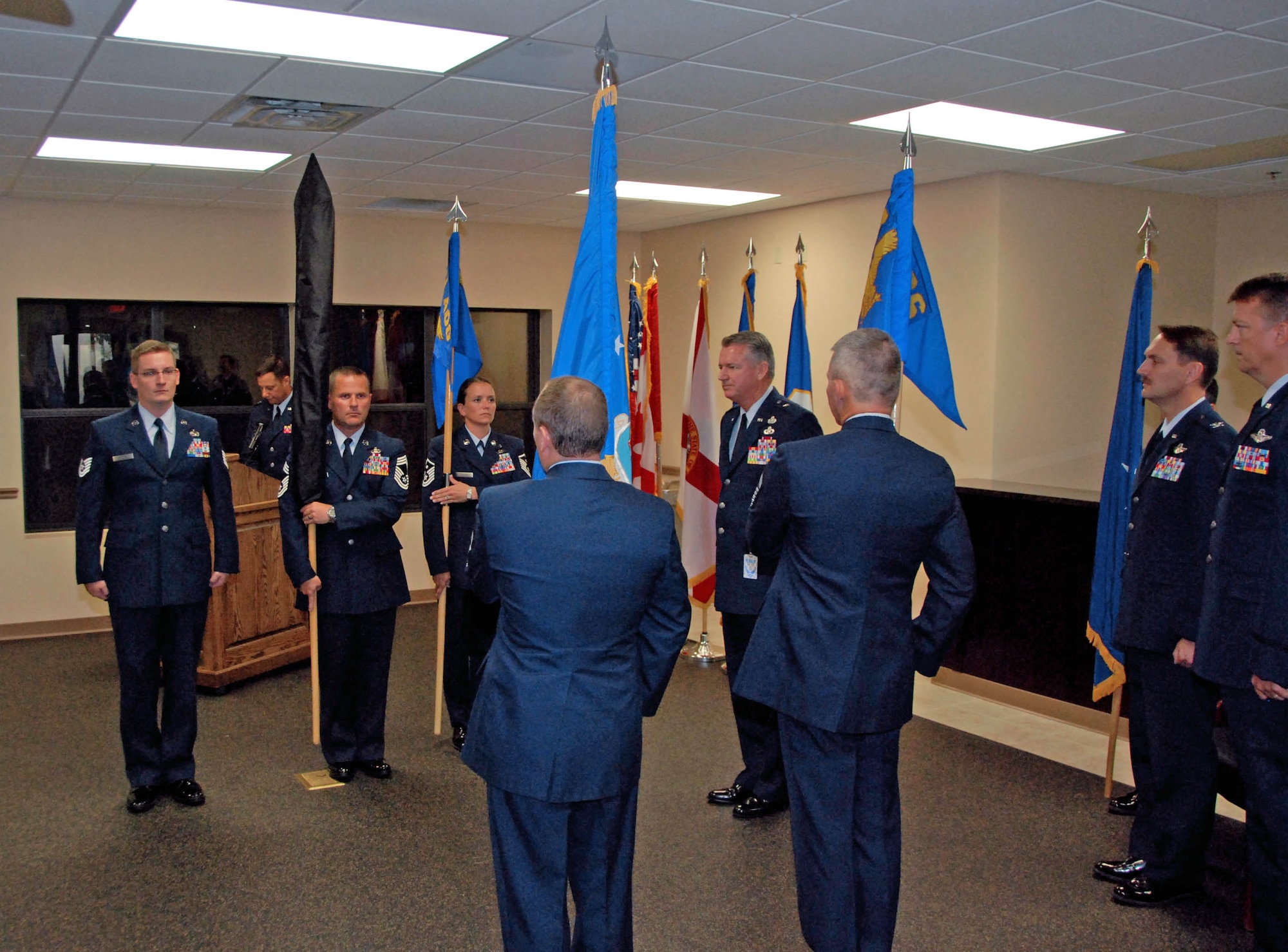 Officials with the 601st Air and Space Operations Center at Tyndall Air Force Base, Fla., participate in a ceremony Aug. 21, 2010, to present the guidon of the newly formed 101st Air and Space Operations Group, formerly known as Southeast Air Defense Sector.  (U.S. Air Force photo/Capt. Jared Scott)