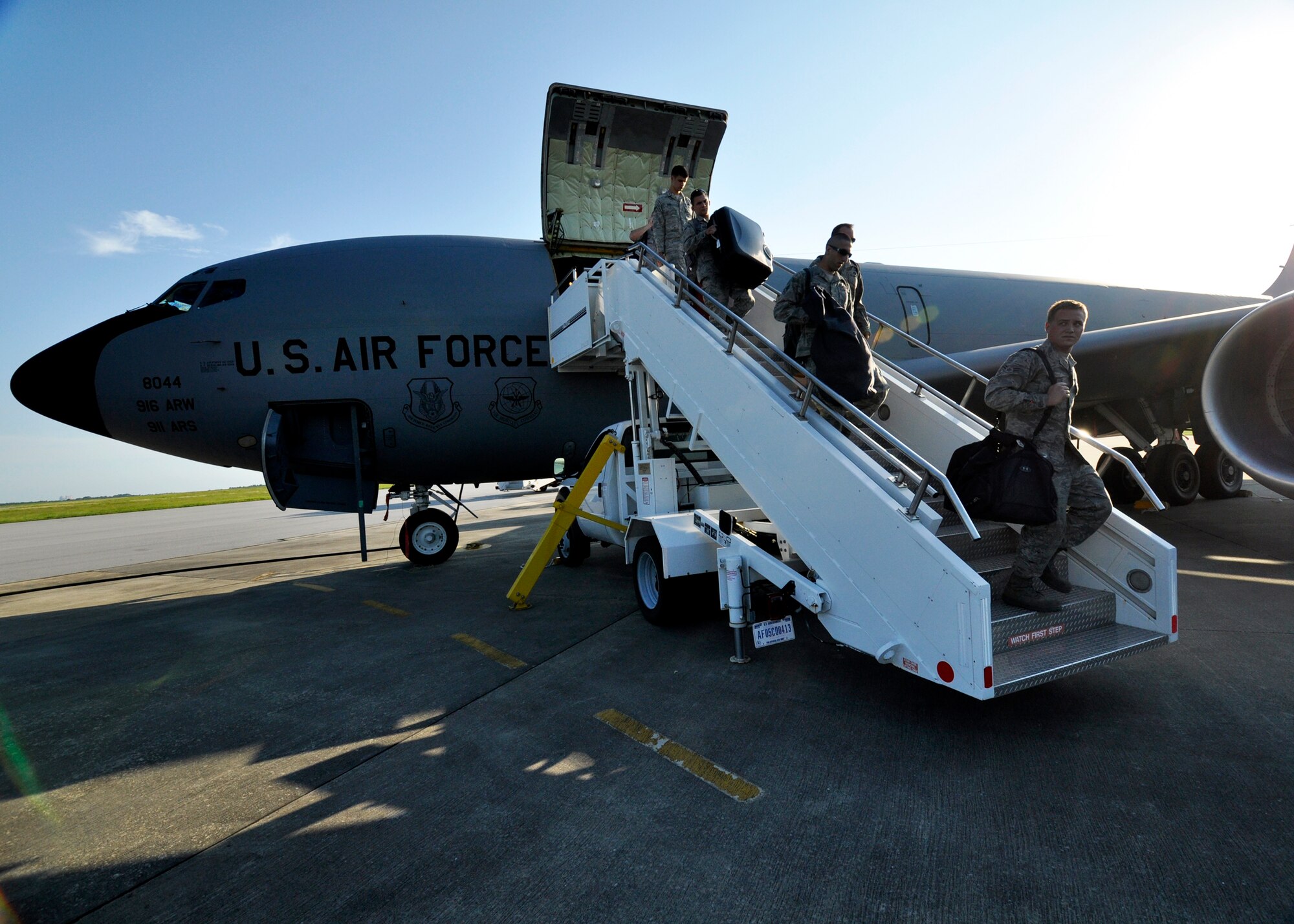 Maintainers and security forces Airmen from the 4th Fighter Wing disembark the KC-135 Stratotanker after arriving to Eglin Air Force Base Fla., Sept. 1 as part of a hurricane evacuation from Seymour Johnson AFB, N.C.  Approximately 30 F-15E Strike Eagles, three KC-135s, and 300 personnel arrived to beddown the aircraft as Hurricane Earl headed for the N.C. coast.  The 33rd Fighter Wing, a former F-15 unit now the training wing for the F-35 Lightning II, provided flightline space for the aircraft.  (U.S. Air Force photo/Samuel King Jr.)