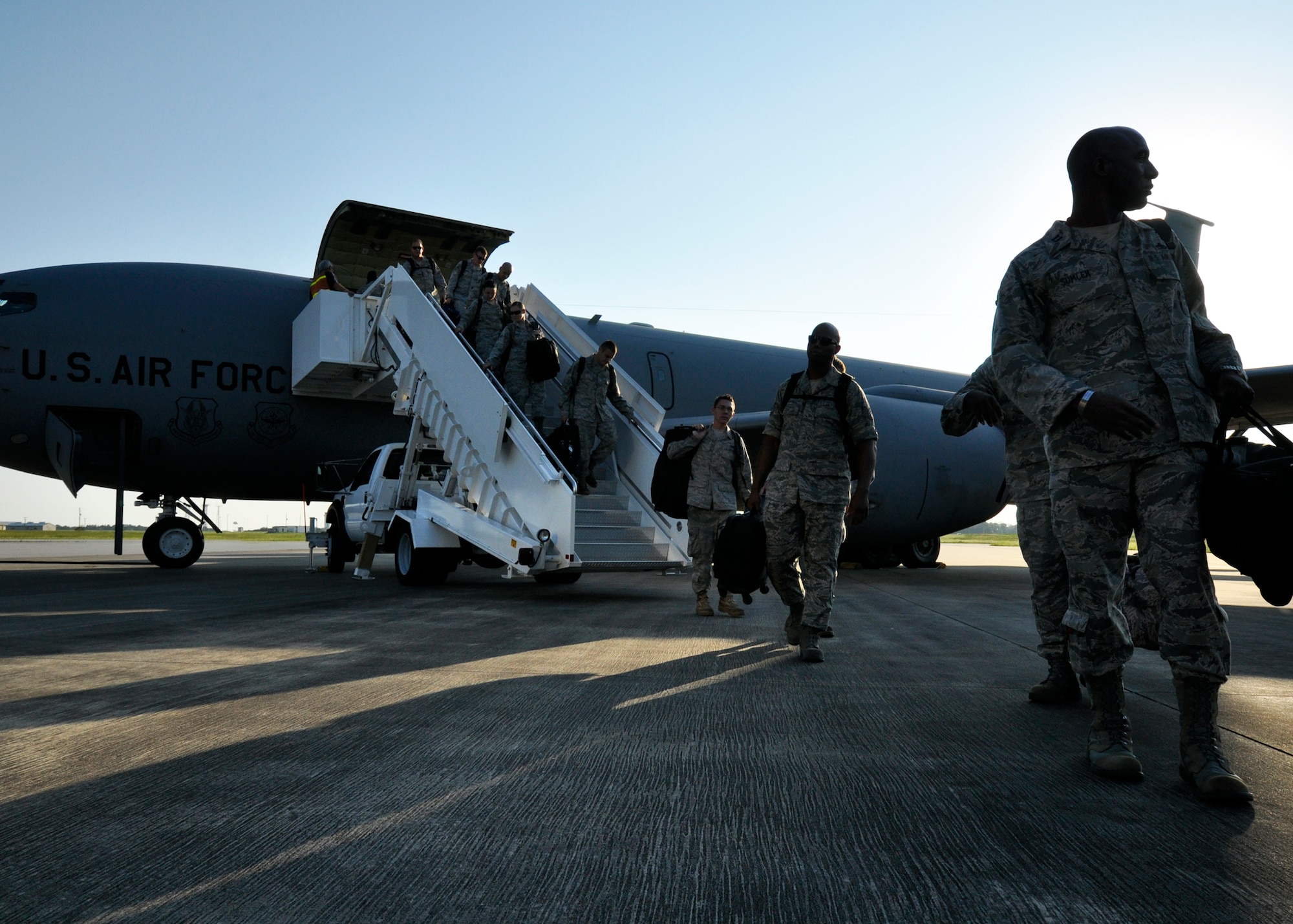 Maintainers and security forces Airmen from the 4th Fighter Wing disembark the KC-135 Stratotanker after arriving to Eglin Air Force Base Fla., Sept. 1 as part of a hurricane evacuation from Seymour Johnson AFB, N.C.  Approximately 30 F-15E Strike Eagles, three KC-135s, and 300 personnel arrived to beddown the aircraft as Hurricane Earl headed for the N.C. coast.  The 33rd Fighter Wing, a former F-15 unit now the training wing for the F-35 Lightning II, provided flightline space for the aircraft.  (U.S. Air Force photo/Samuel King Jr.)