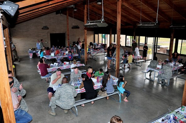 Mighty Ninety leadership talk with the Airmen and families of those who have recently deployed or are tasked to deploy during the Deployed Airmen Barbecue held in the base lakes pavilion Friday. (U.S. Air Force photo by Staff Sgt. Chad Thompson)