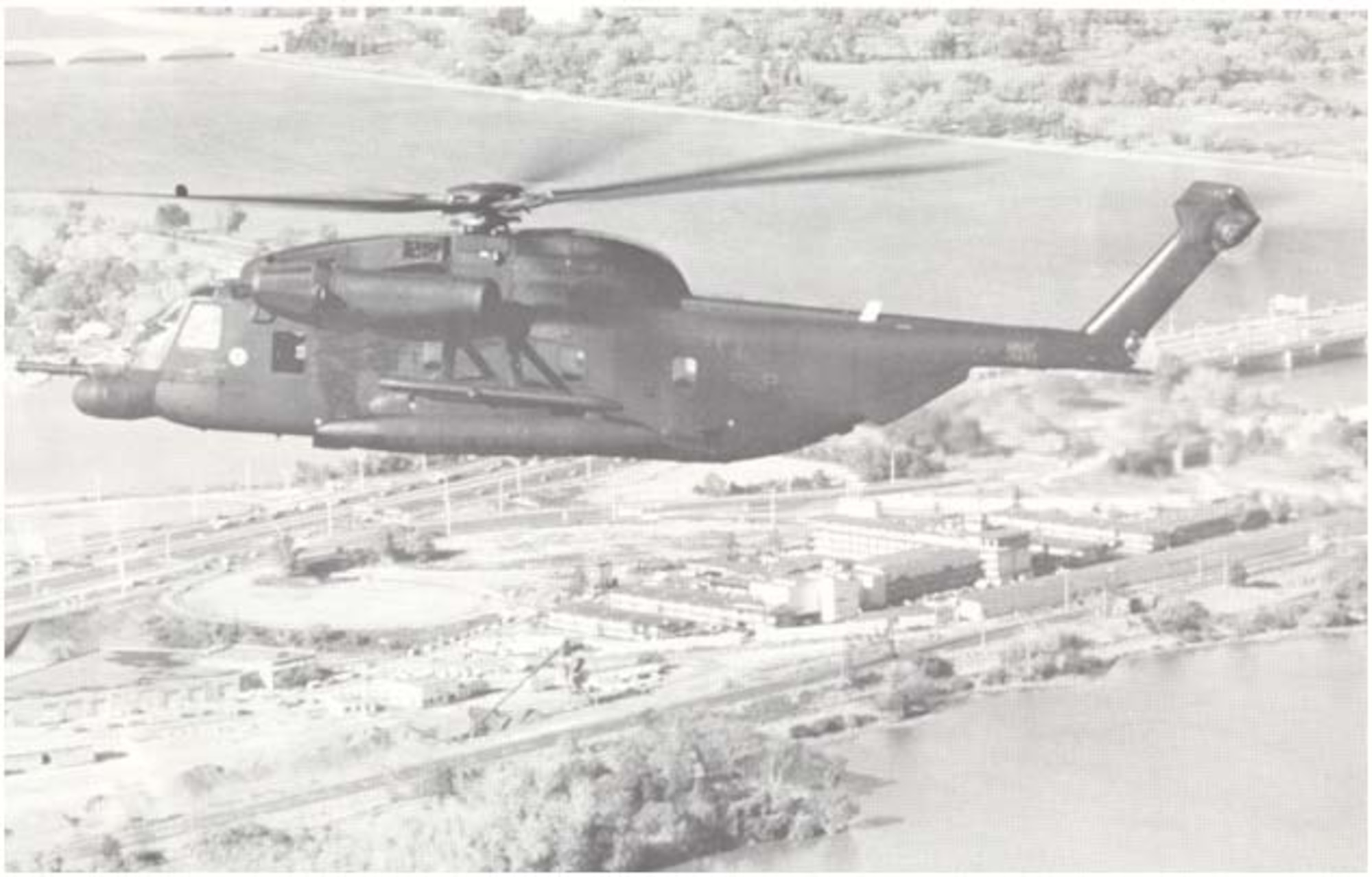 Helicopter 66-14433 flies over Washington, D.C., in 1975 shortly after its modification to the Pave Low configuration. The aircraft was reassigned to the 1550th Aircrew Training and Test Wing at Kirtland AFB in January 1976. USAF photo by Staff Sgt. Robert Kay.