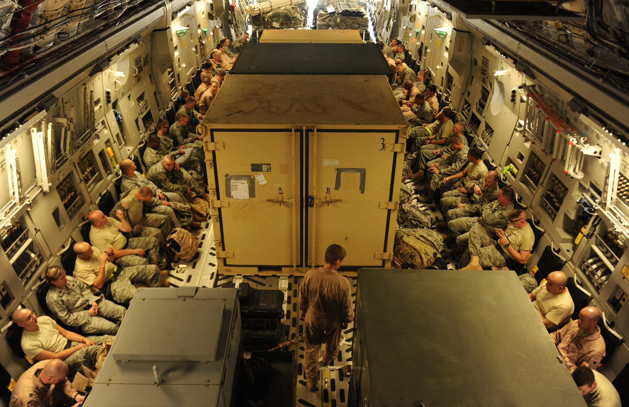 MOODY AIR FORCE BASE, Ga. --Members from the 347th Rescue Group strap into a C-17 Globemaster III here Aug. 26. “Team Rescue” consisting of the 71st Rescue Squadron, 38th Rescue Squadron and 41st Rescue Squadron will be deploying together as a whole group to Afghanistan. (U.S. Air Force photo/ Airman 1st Class Benjamin Wiseman)
