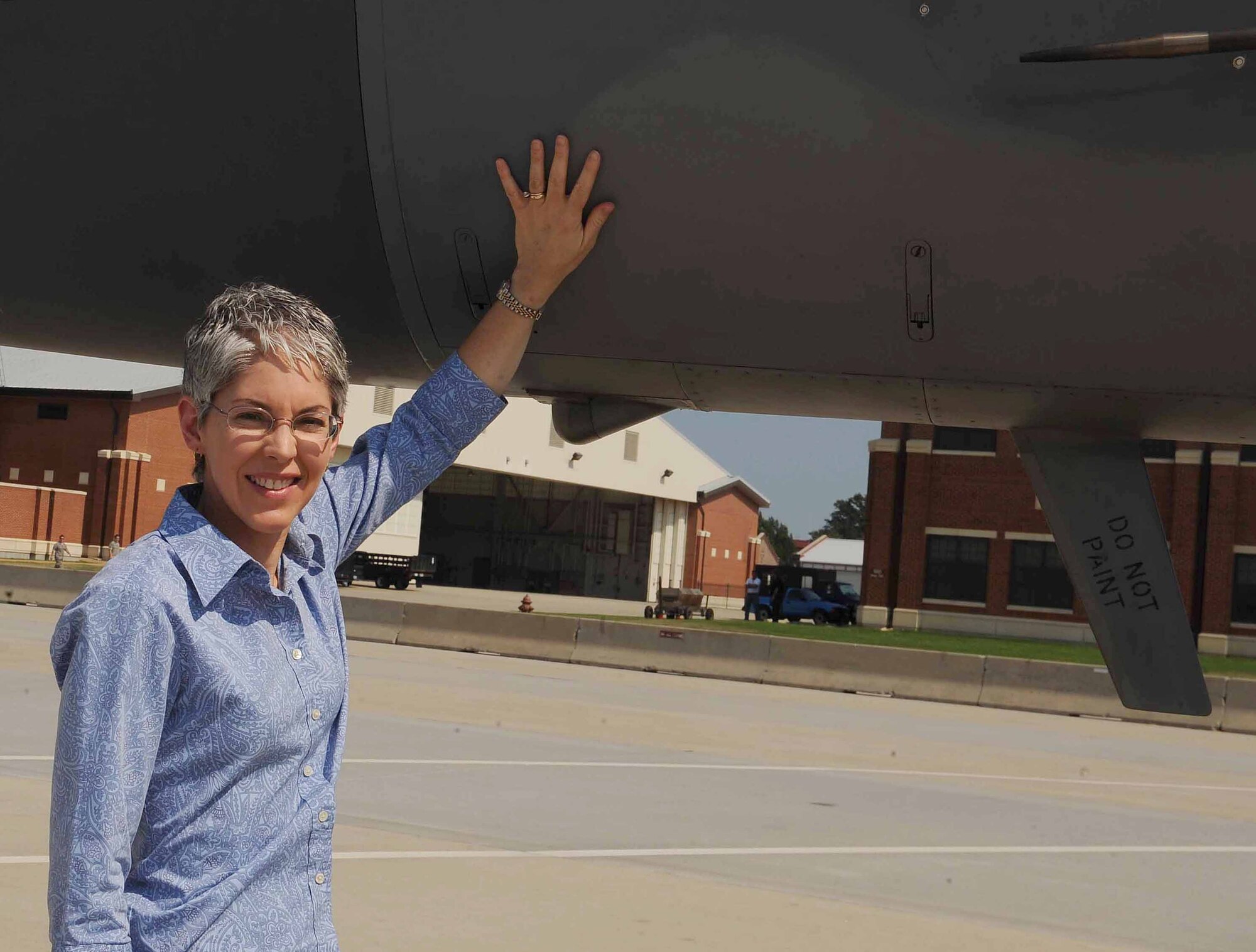 LANGLEY AIR FORCE BASE, Va.-- Mrs. Terri Morris bids farewell to the final F-15 Eagle to leave Langley Sept.1.  As a schoolgirl in 1976, Mrs. Morris won a contest to name the first Eagle stationed at Langley, “Peninsula Patriot.”  (U.S. Air Force photo/Master Sgt. Anna Hayman)(RELEASED)