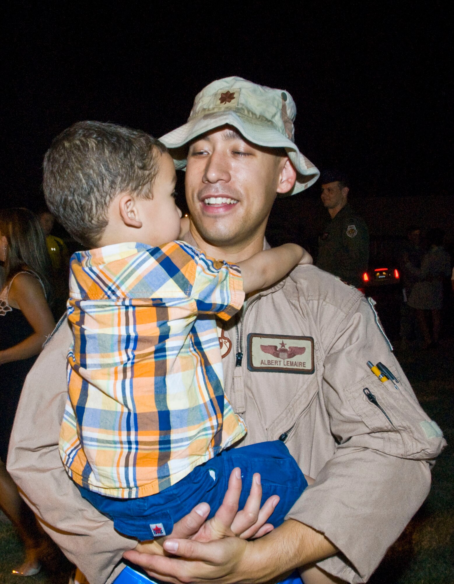 Liam Lemaire, 3, gives a big welcome home hug to his father, Maj. H. Albert Lemaire, 19th Operations Support Squadron chief of wing tactics, Sept. 1 at the Little Rock Air Force Base passenger terminal. Family members, friends and base leaders came out to welcome home more than 160 Airmen returning from deployments in Southwest Asia.  (U.S. Air Force photo by Staff Sgt. Nestor Cruz)