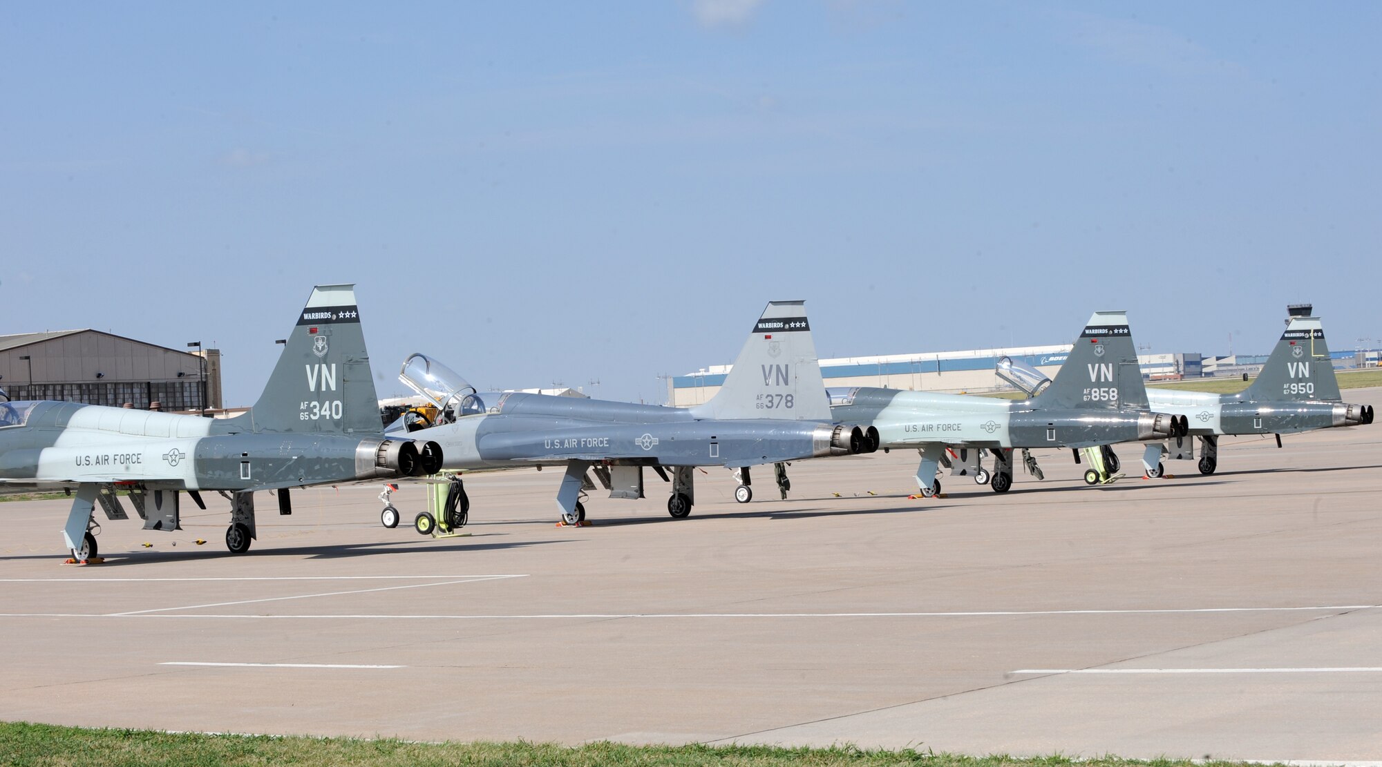 Four T-38 aircraft from Wright-Patterson, Air Force Base, Ohio, wait to be refueled at McConnell’s flightline Aug. 31, 2010, McConnell Air Force Base, Kan.  All aircraft that land at McConnell must coordinated with the base’s air traffic control tower and airfield management for permission and support for their landing.  (U.S. Air Force photo/Airman 1st Class Andrea Salazar)