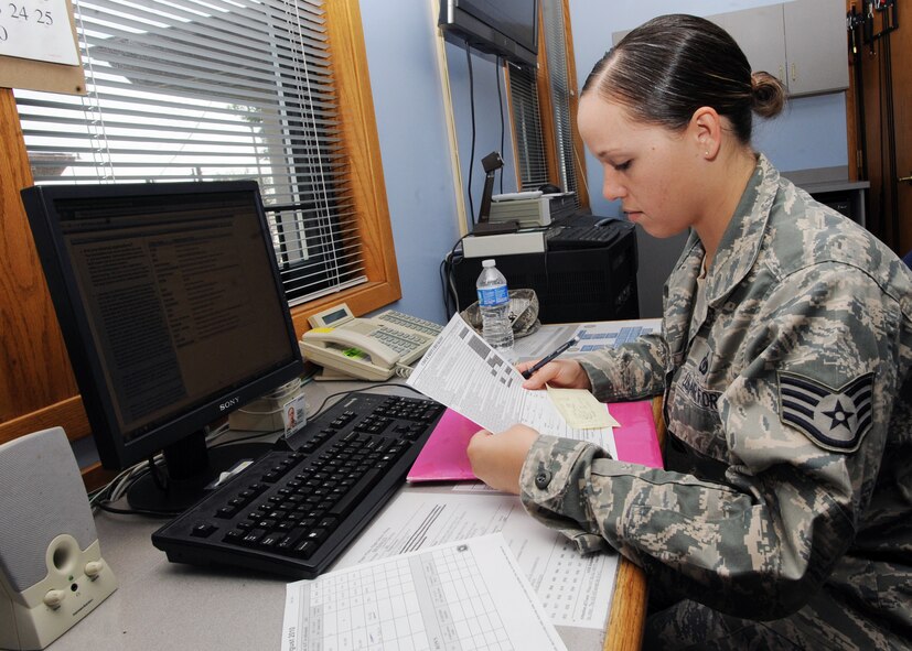 Staff Sgt. Myshel Rush, 22nd Operations Support Squadron airfield management operations supervisor, reviews a shift checklist of Airmen’s schedules Aug. 31, 2010, McConnell Air Force Base, Kan.  The airfield management flight conducts 24-hour shifts to ensure McConnell’s runways and taxiways are operating efficiently to meet mission requirements.  The flight also acts as secondary responders for the removal of wildlife on or near airfields to help reduce aircraft mishaps and loss of life.  (U.S. Air Force photo/Airman 1st Class Andrea Salazar)