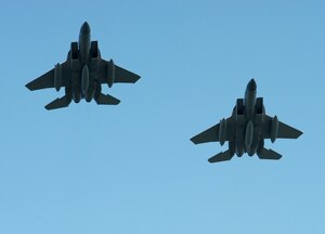 LANGLEY AIR FORCE BASE, Va -- The last two operational F-15 Eagles soar out of our air space, destined for Portland, Ore., Sept. 1 as the historic Ironmen squadron is scheduled to be inactivated. The F-15 aircrafts are being sent to active duty bases within the United States, overseas and National Guard Bases. Like the Aircraft the majority of the Airmen, pilots and maintenance personnel are being allocated to various bases.  (U.S. Air Force photo/Staff Sgt. Tabitha Kuykendall)(RELEASED)