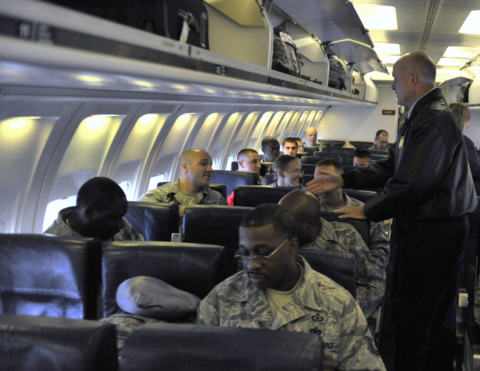 Col. Pete Hronek, 120th Fighter Wing commander, took time to bid farewell to the first group of RED HORSE Airmen to board a chartered plane enroute to pre-deployment training Aug. 30. (U.S. Air Force photo/John Turner)
