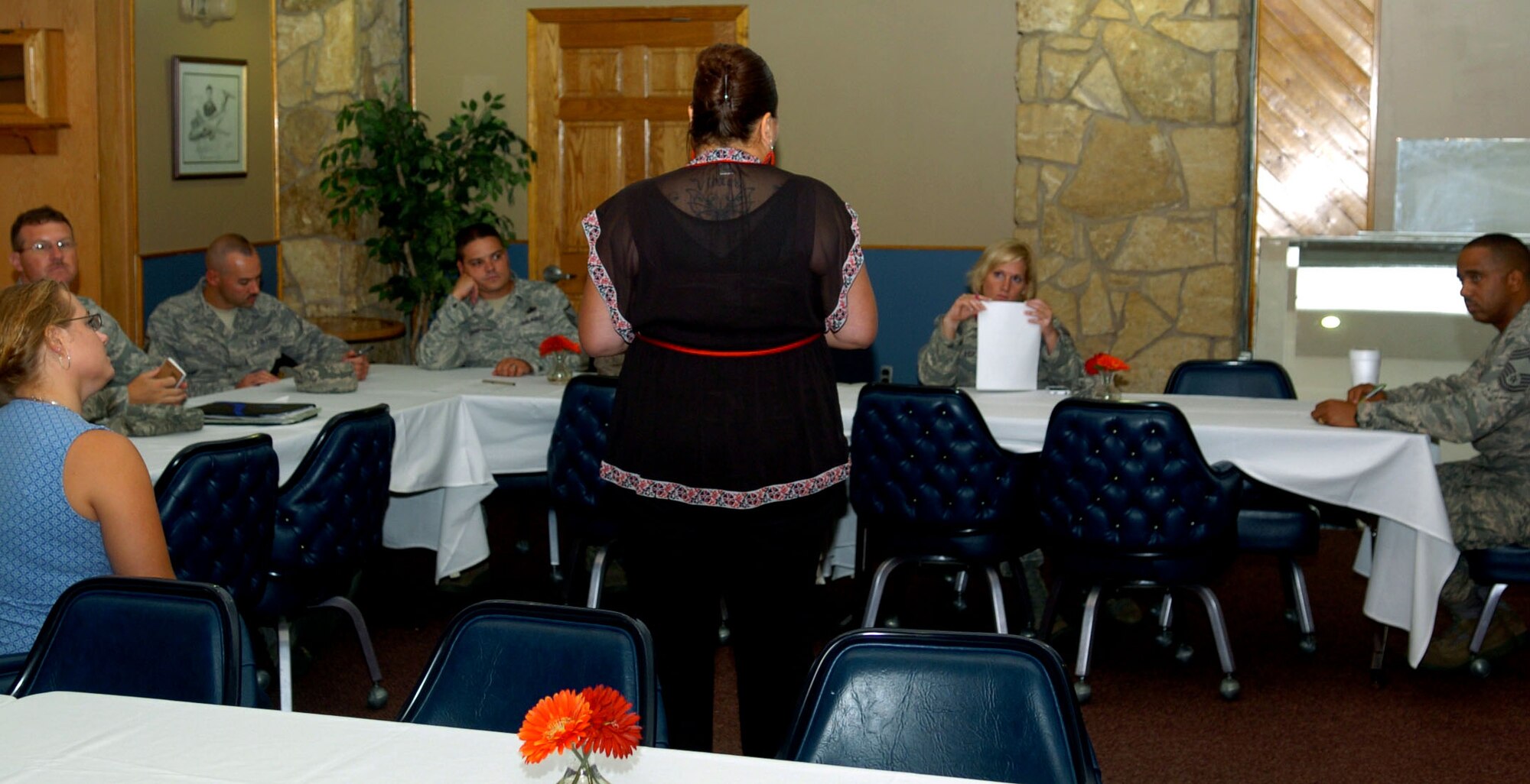 ALTUS AIR FORCE BASE, Okla -- Marlene Diaz (center), the new Club Altus manager, holds a focus group in the Top 3 Lounge at Club Altus. Diaz plans more focus groups as a way of getting input for improvements to the Club. (U.S. Air Force photo by Tech. Sgt. Jennifer D. Seidl / Released 97 Air Mobility Wing Public Affairs)