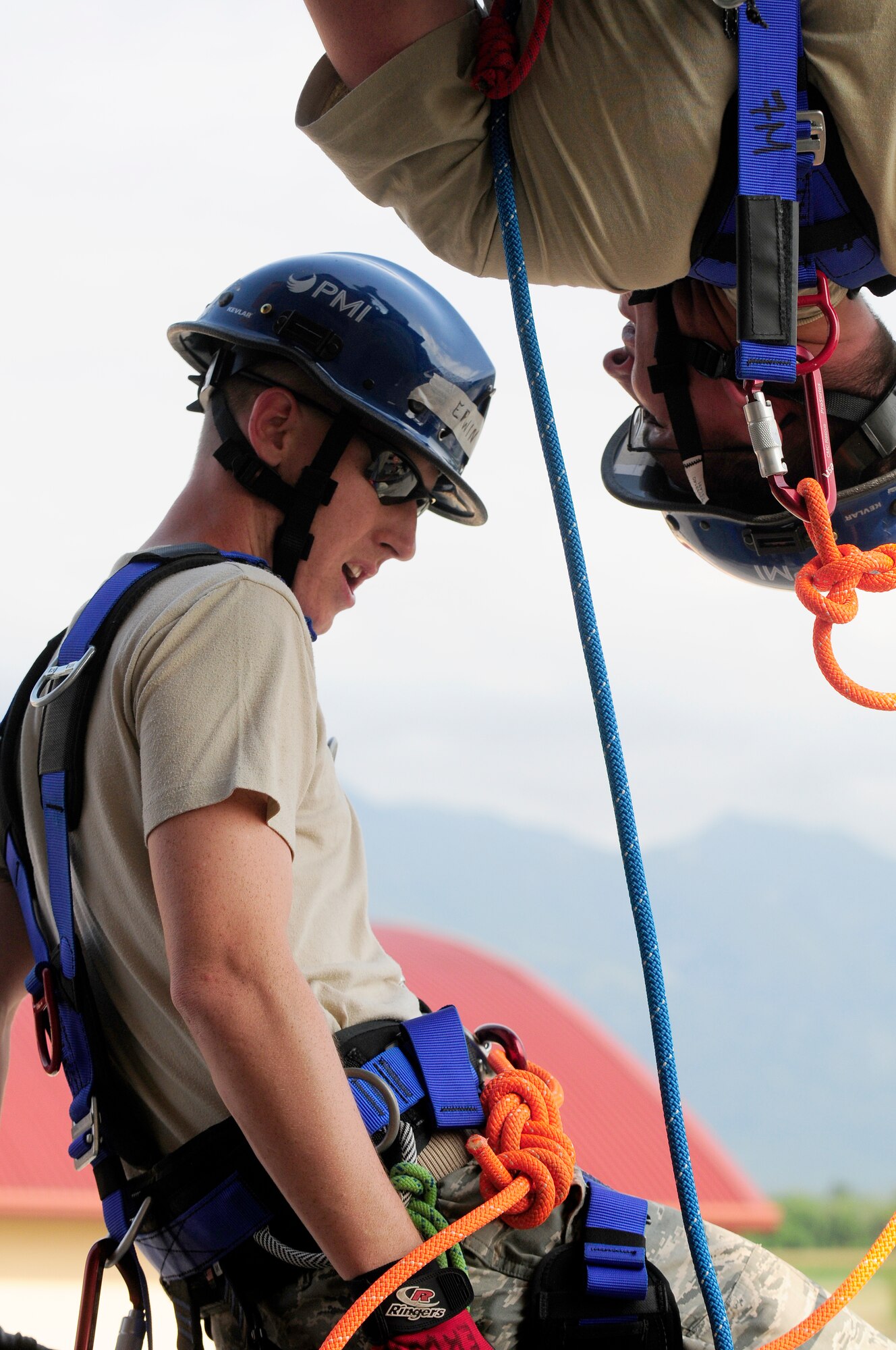 Staff Sgts. Chris Erwin and Kyle Bailey, 31st Civil Engineer Squadron firefighters, practice technical rope maneuvers during specialized rescue training Aug. 26. The 80-hour training course included classroom education and 73 hours of practical application consisting of automobile extrication, technical rope and confined space rescues. (U.S. Air Force photo/Airman 1st Class Katherine Windish)