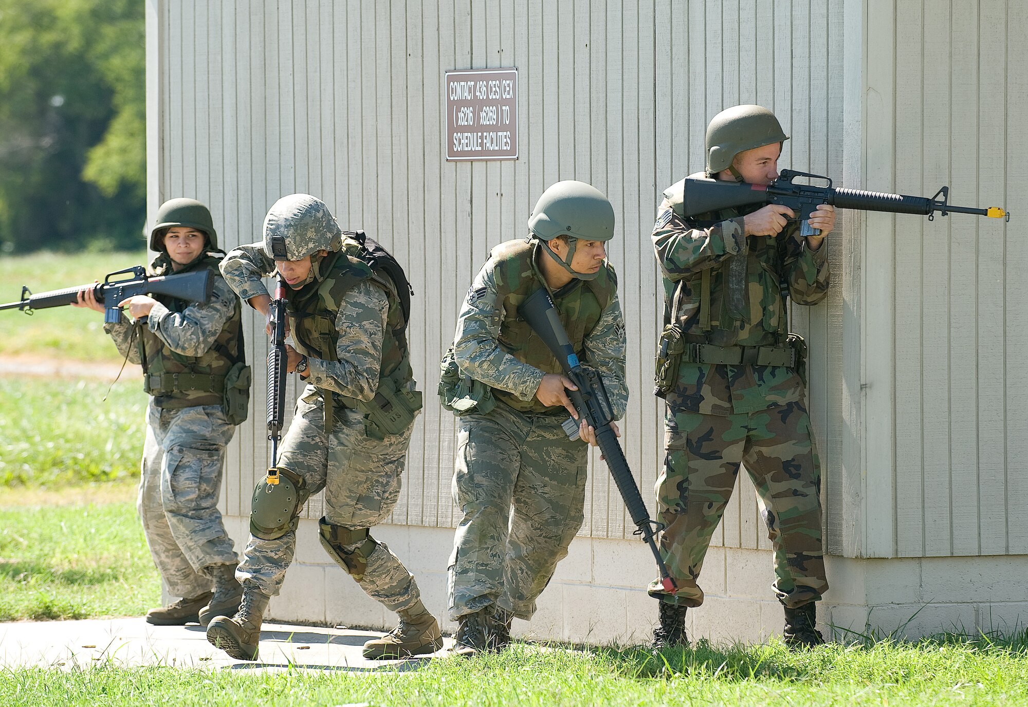 Sixteen Airmen slated to deploy participated in an Expeditionary Combat Skills Training course on Dover Air Force Base, Del., Aug. 27, 2010. The Airmen reacted to various scenarios they may encounter while overseas. (U.S. Air Force photo by Jason Minto/Released)