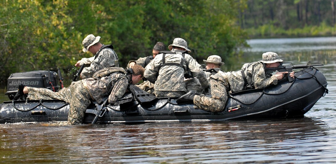 U.S. Army soldiers load into their zodiac boat after extracting a simulated casualty from the beach at Mott Lake during their waterborne operations training on Fort Bragg, N.C., Aug. 26, 2010. The soldiers are assigned to Company F, 2nd Battalion, 82nd Combat Aviation Brigade. 