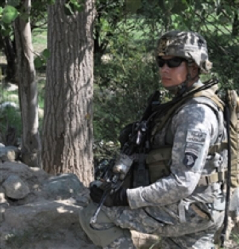U.S. Army Spc. Adam D. Lopez, a team leader with Alpha Company, 2nd Battalion, 327th Infantry Regiment, provides security during a visit to Lar Sholtan village in Kunar province, Afghanistan, on Aug. 21, 2010.  
