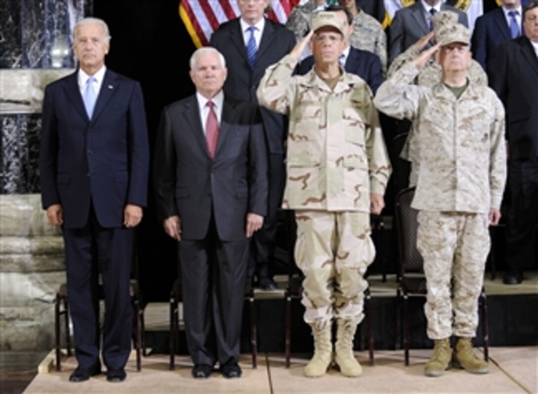 Vice President Joe Biden (left), Secretary of Defense Robert M. Gates, Chairman of the Joint Chiefs of Staff Adm. Mike Mullen and Commander of U.S. Central Command Gen. James N. Mattis attend a transfer of command ceremony at Al Faw Palace at Camp Victory in Baghdad, Iraq, on Sept. 1, 2010.  Gen. Loyd Austin III, U.S. Army, relieved Gen. Raymond T. Odierno in command of the remaining forces in Iraq.  